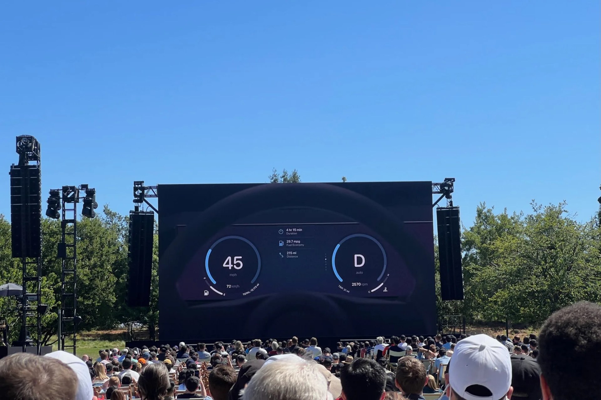 apple carplay instrument display shown on large screen from live event