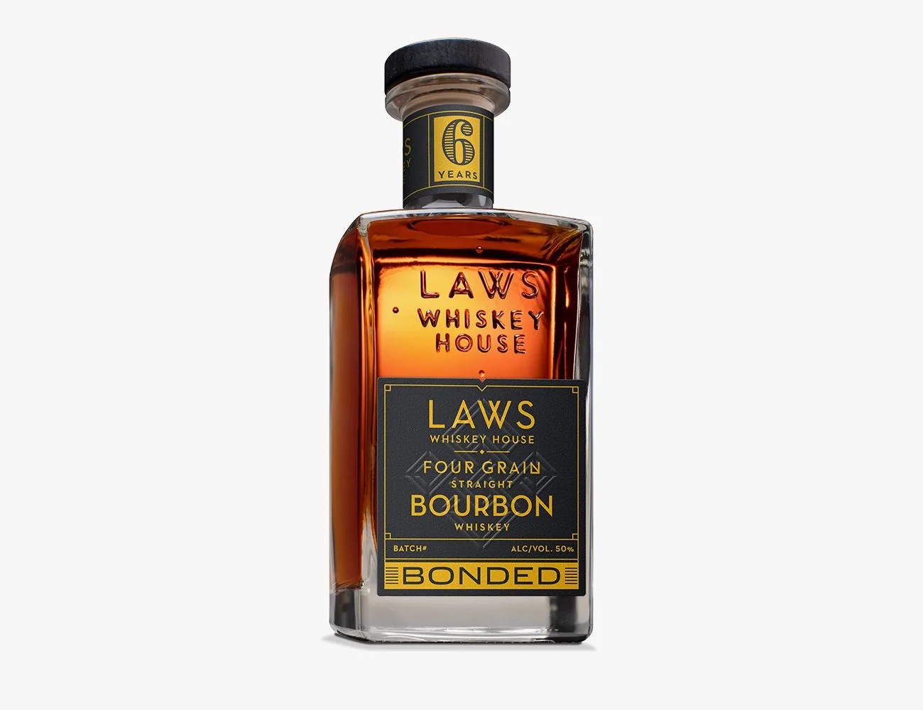 bottle of laws whiskey house four grain bourbon