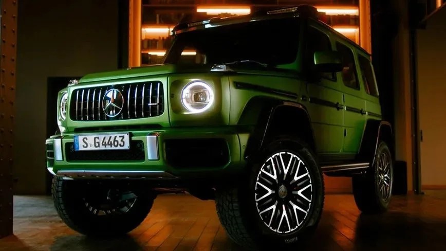 merecdes amg g class 4x4 squared parked on wood floor