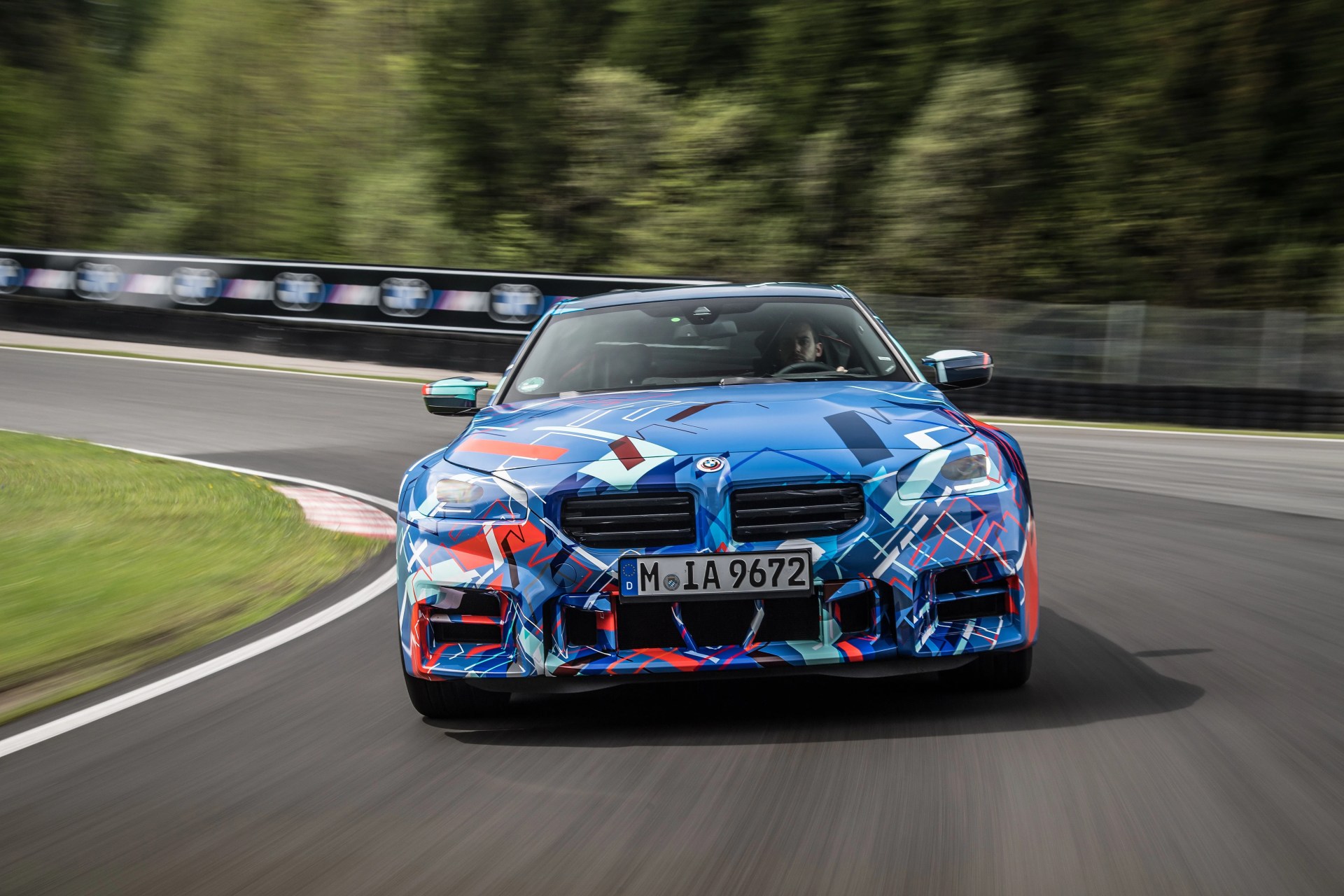 camouflaged bmw m2 testing on track in austria