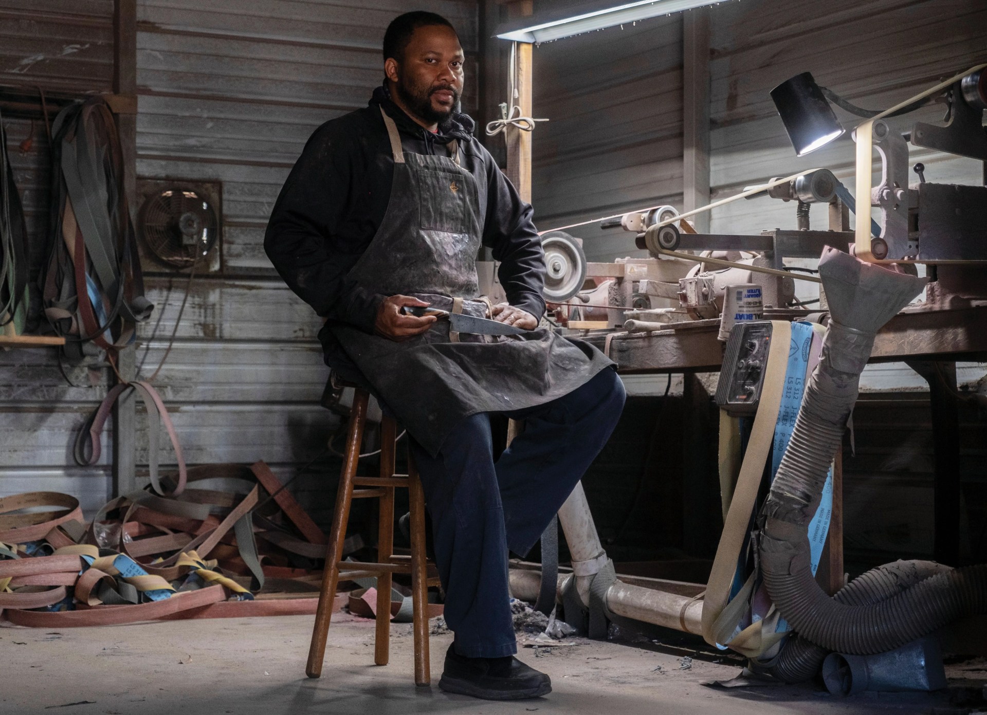quintin middleton sits in his workspace behind his home in saint stephen, south carolina