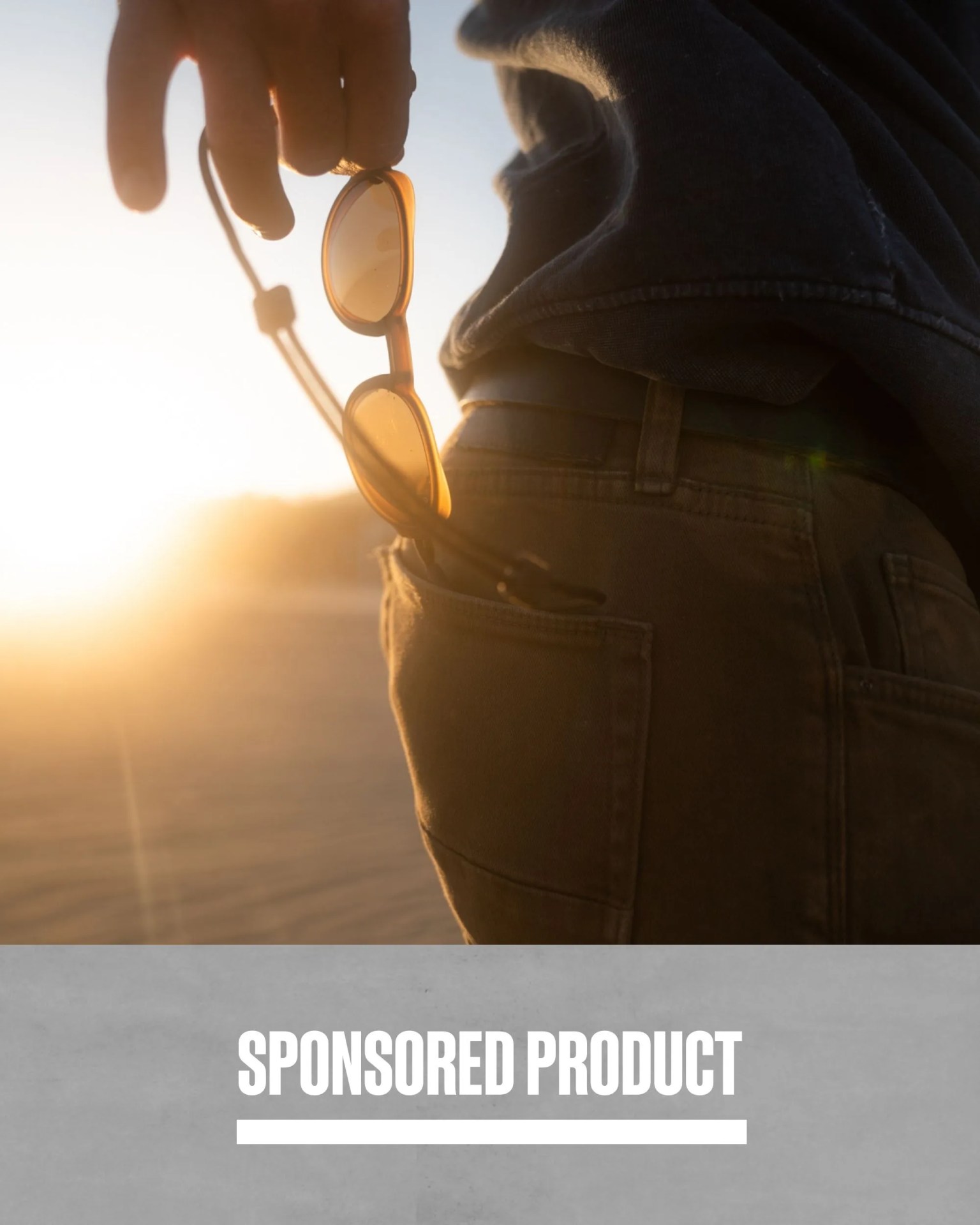 sponsored product man taking ombraz ai designed sunglass lenses out of pocket