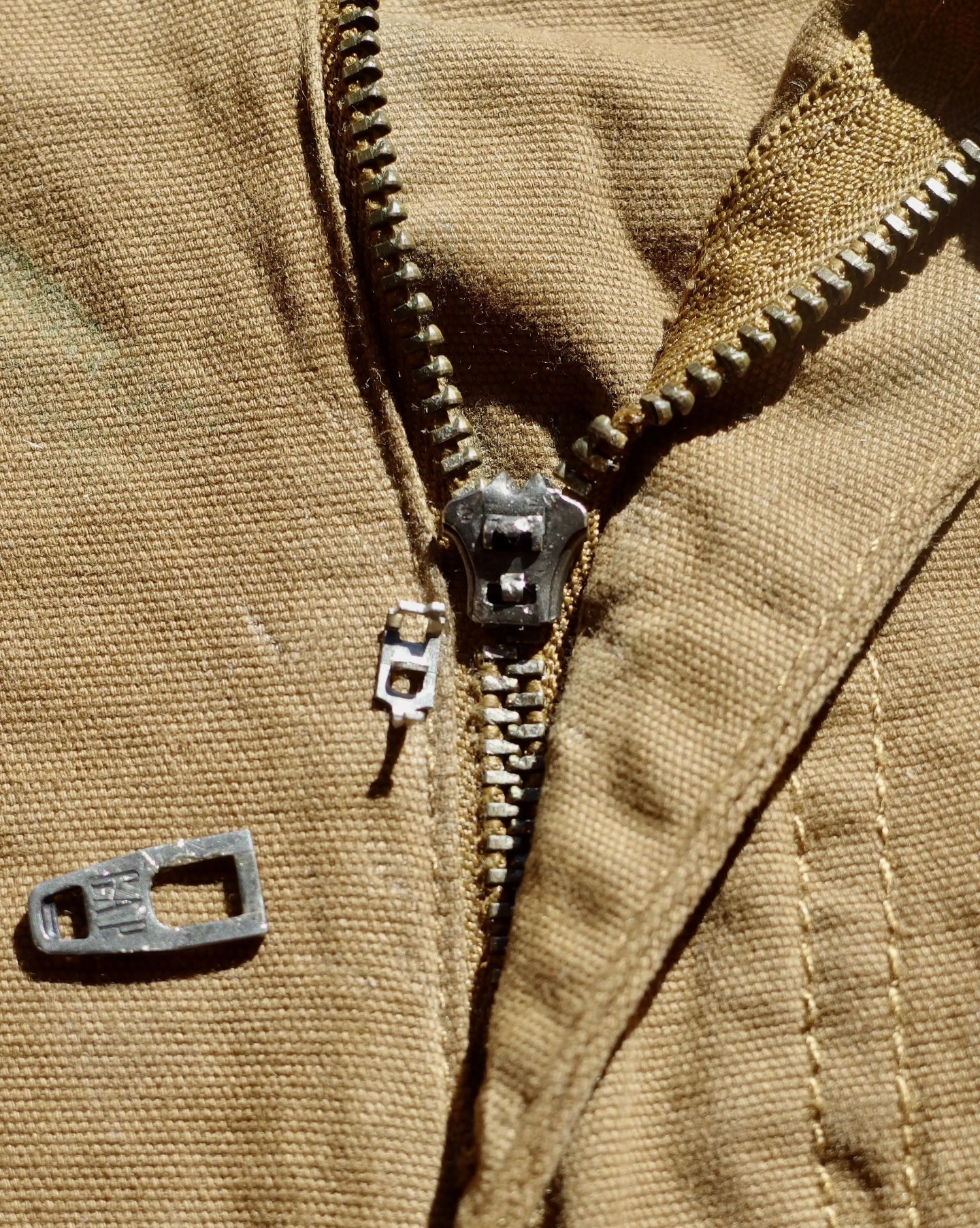a broken zipper up close