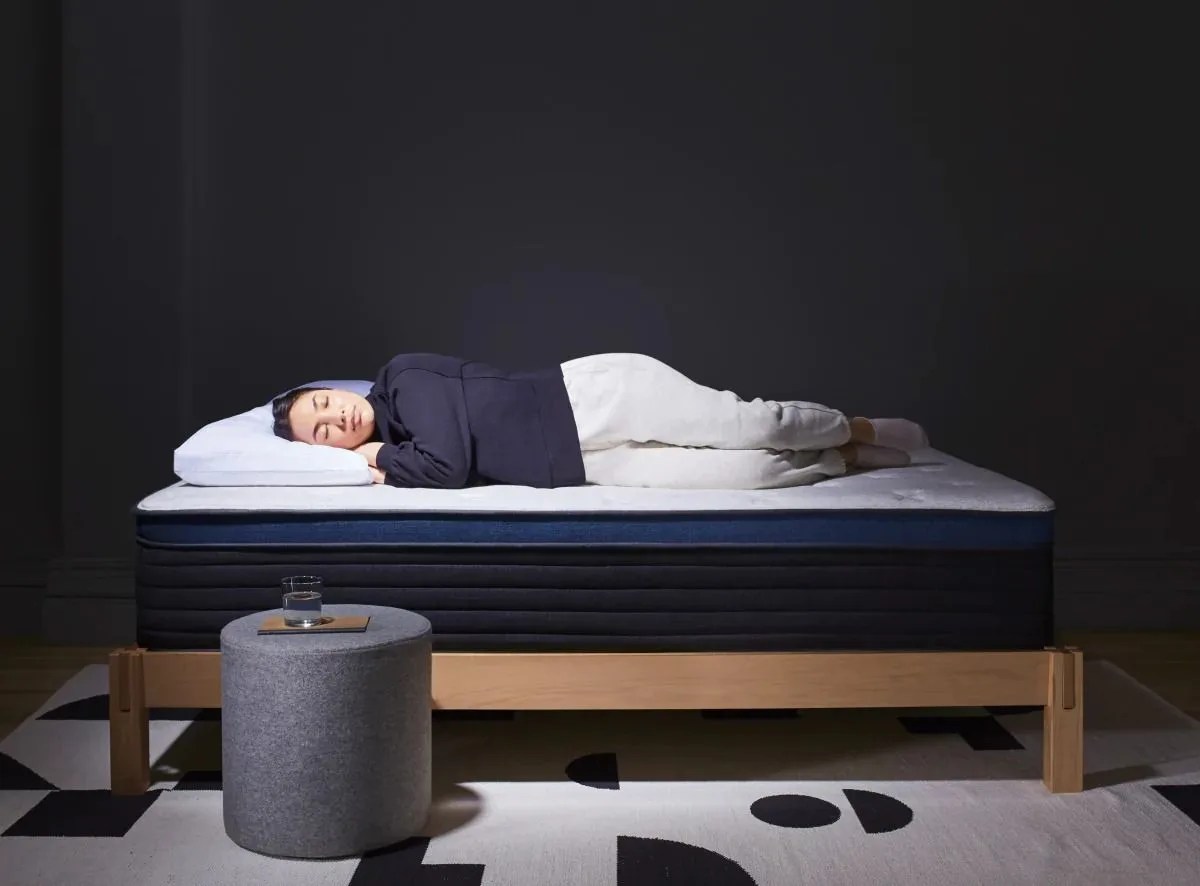 woman sleeping on a helix mattress