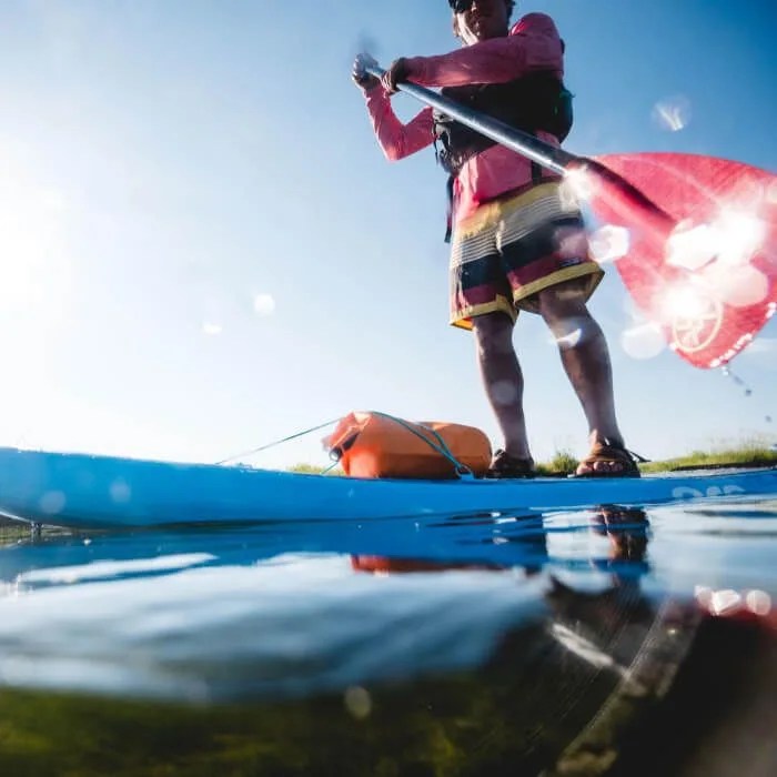 man paddleboarding