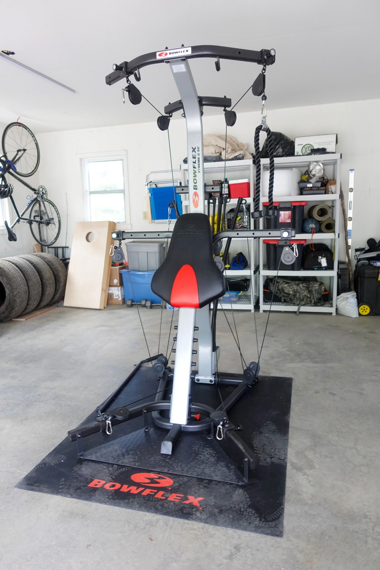bowflex xtreme 2 se machine in a garage