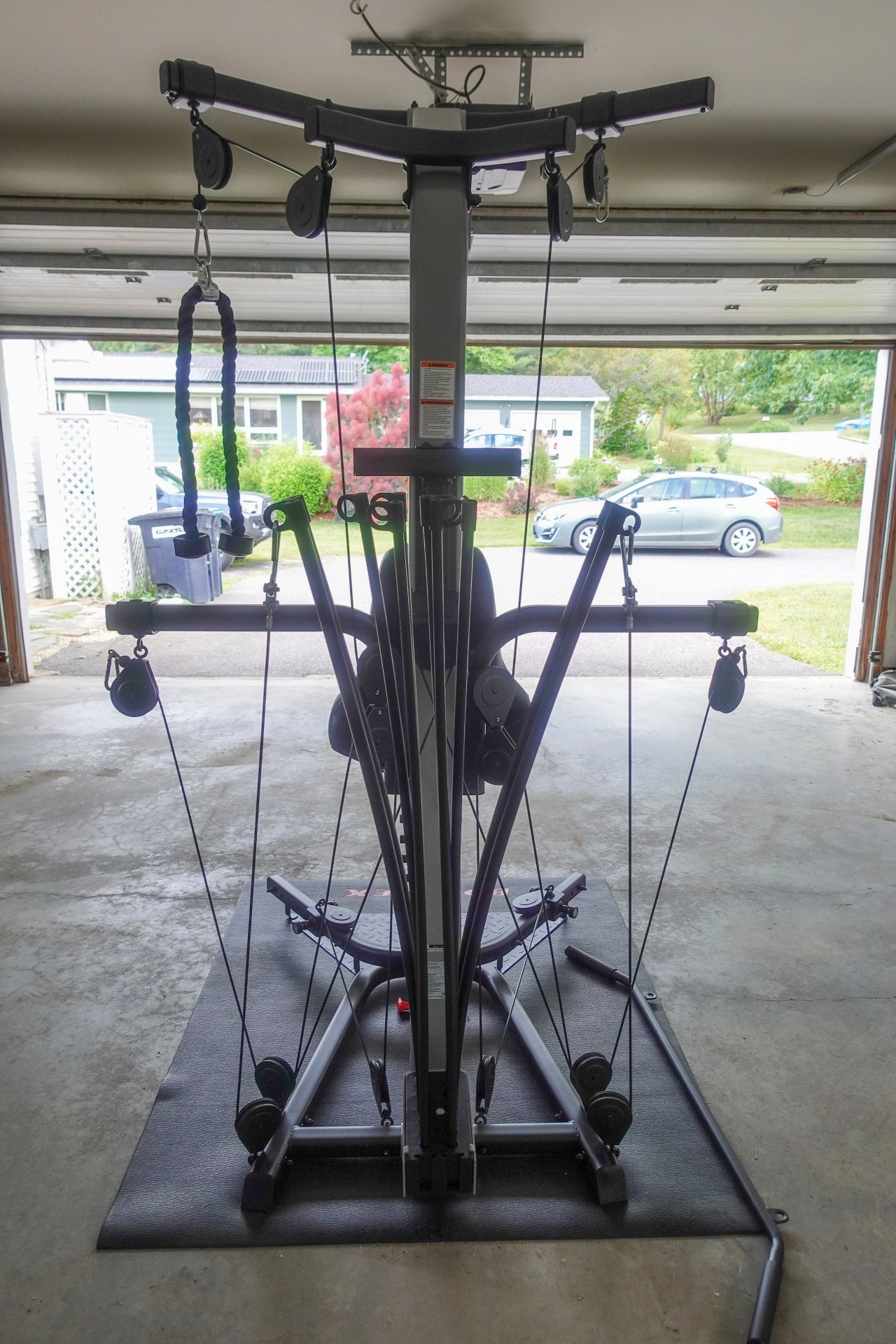 bowflex xtreme 2 se machine in a garage