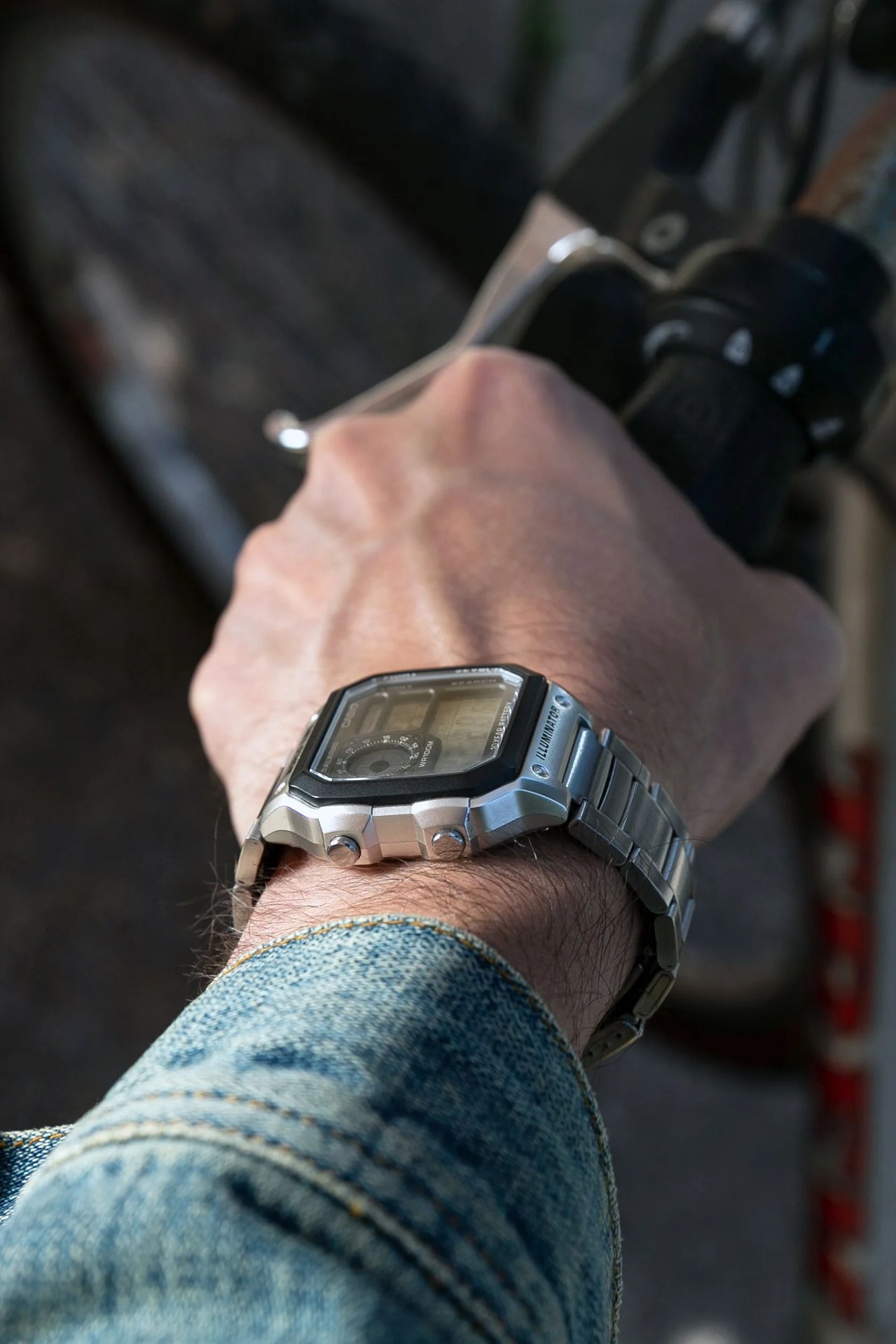 wrist with a casio world time watch
