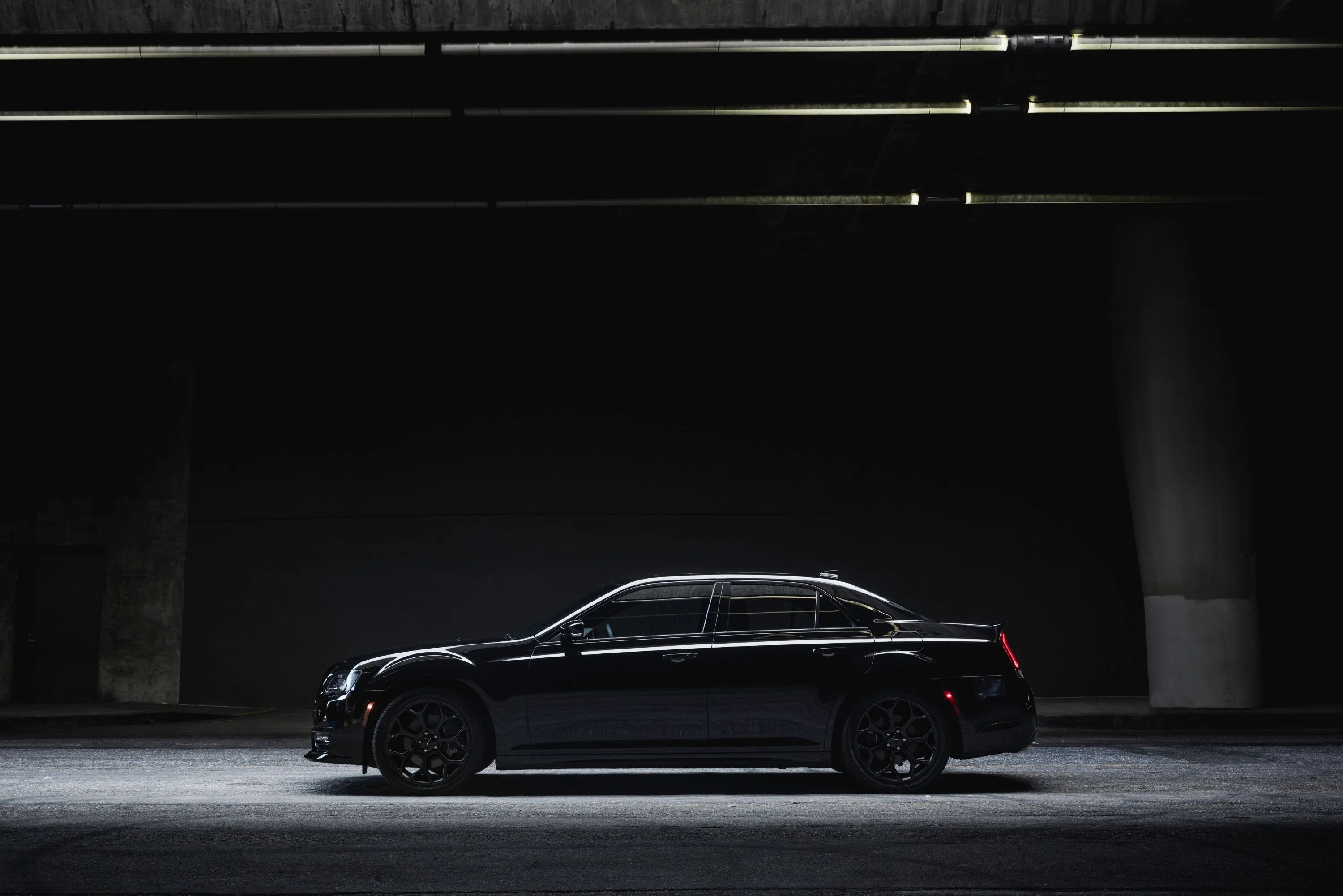 2022 chrysler 300 in a dark studio background