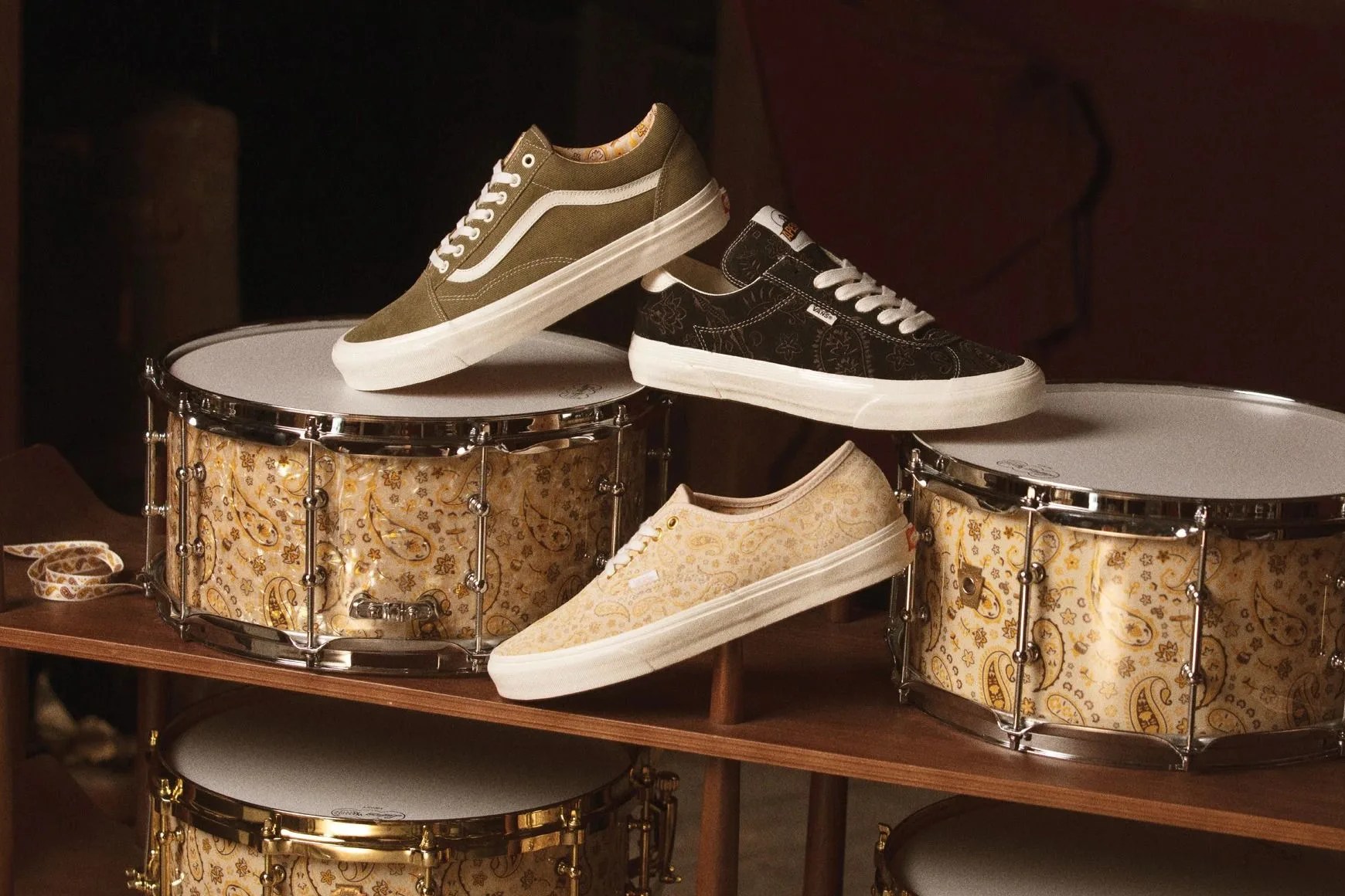 vans shoes on a drum set