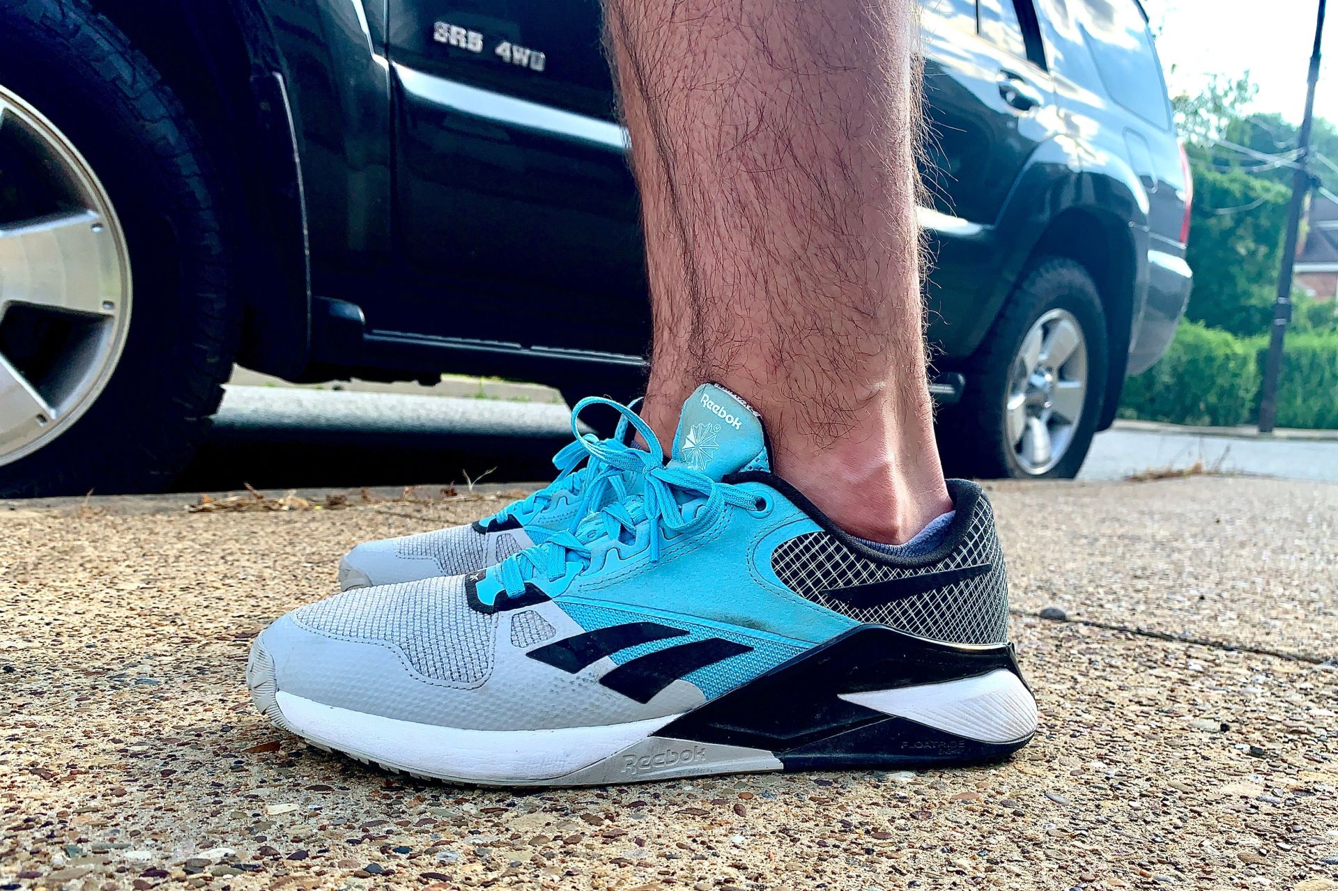 man wearing reebok nano 6000 shoes