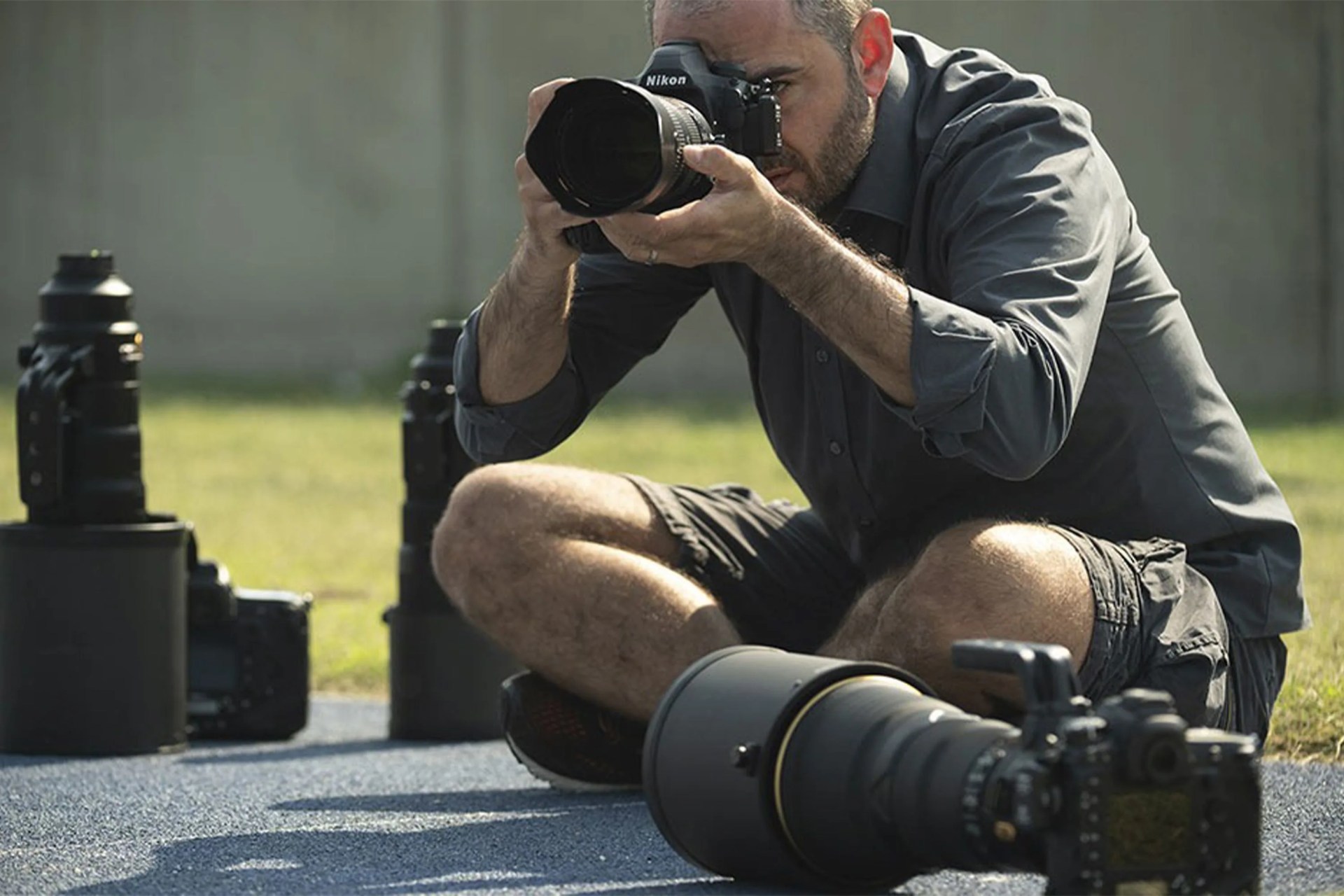 man shooting with a nikon d6 camera