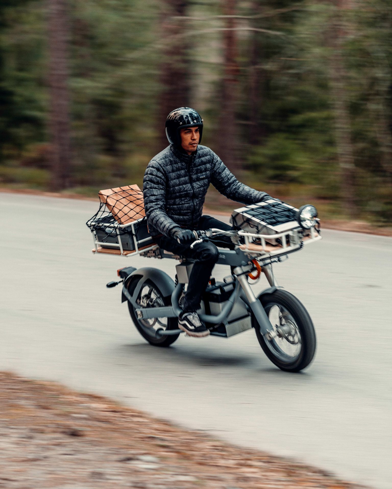 a man riding the osa plus motorcycle