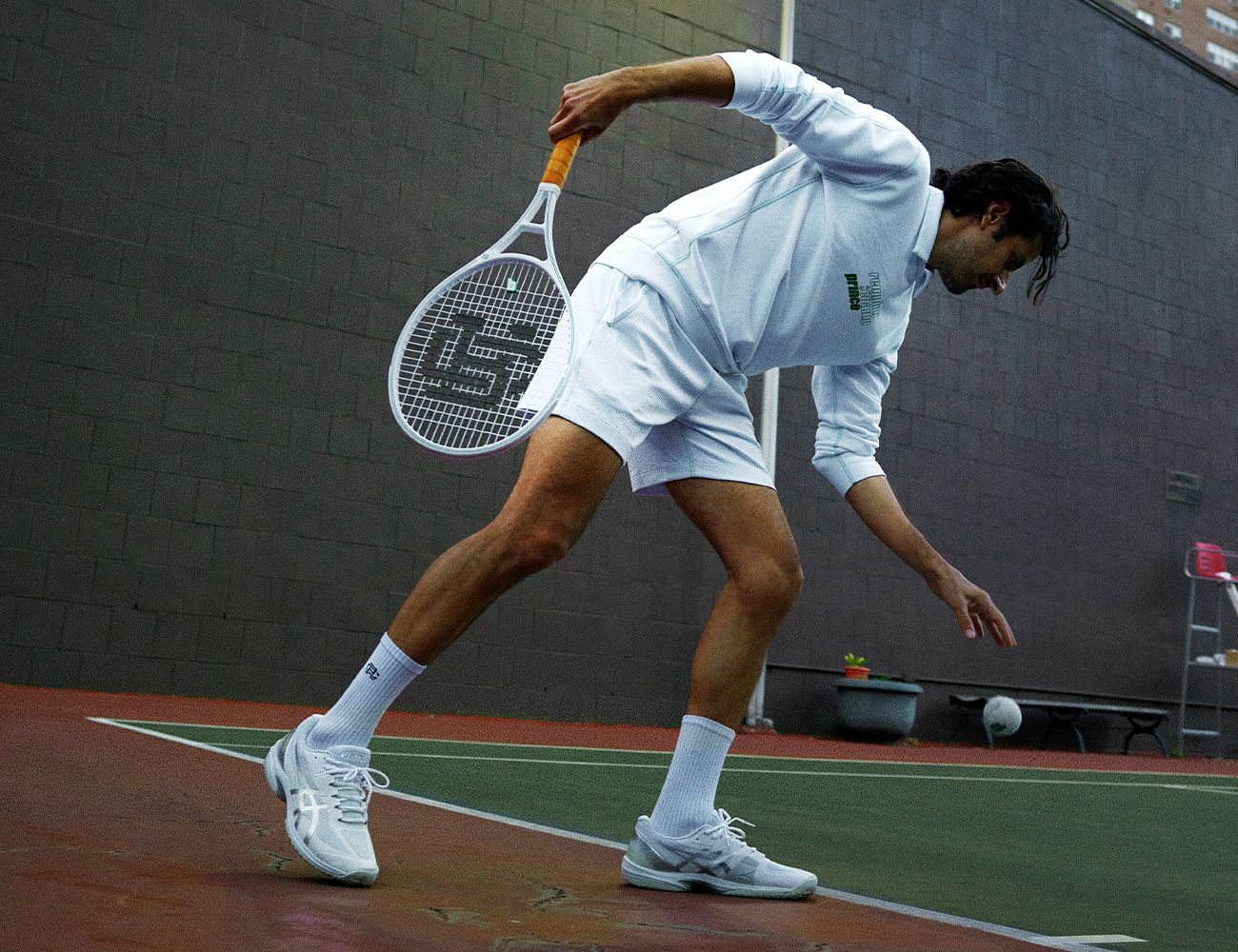 a man playing tennis