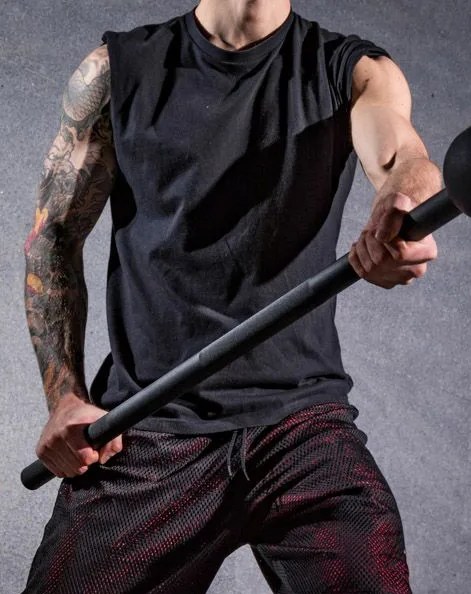 man holding set for set steal mace