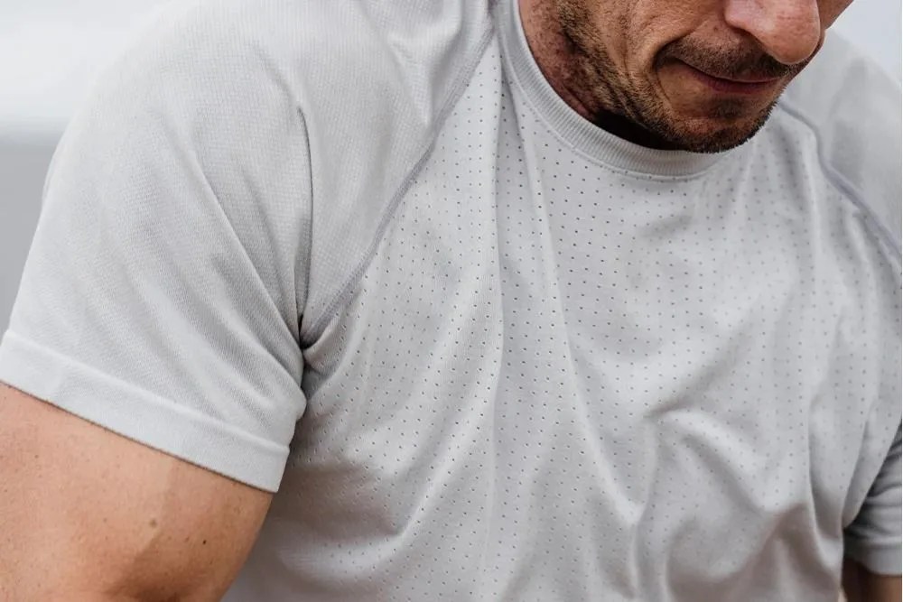 man wearing a ten thousand seamless shirt