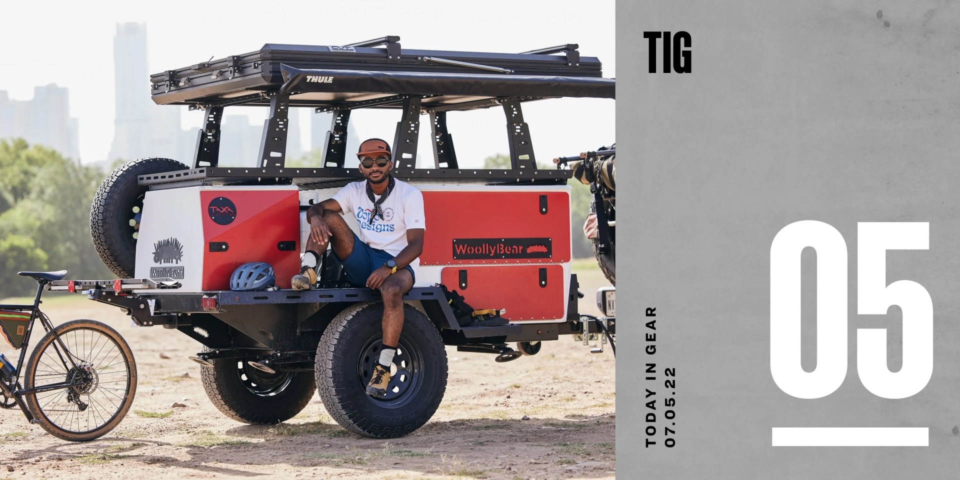 today in gear july 5 2022 man sitting on taxa outdoors x topo designs limited edition kit and basecamp trailer