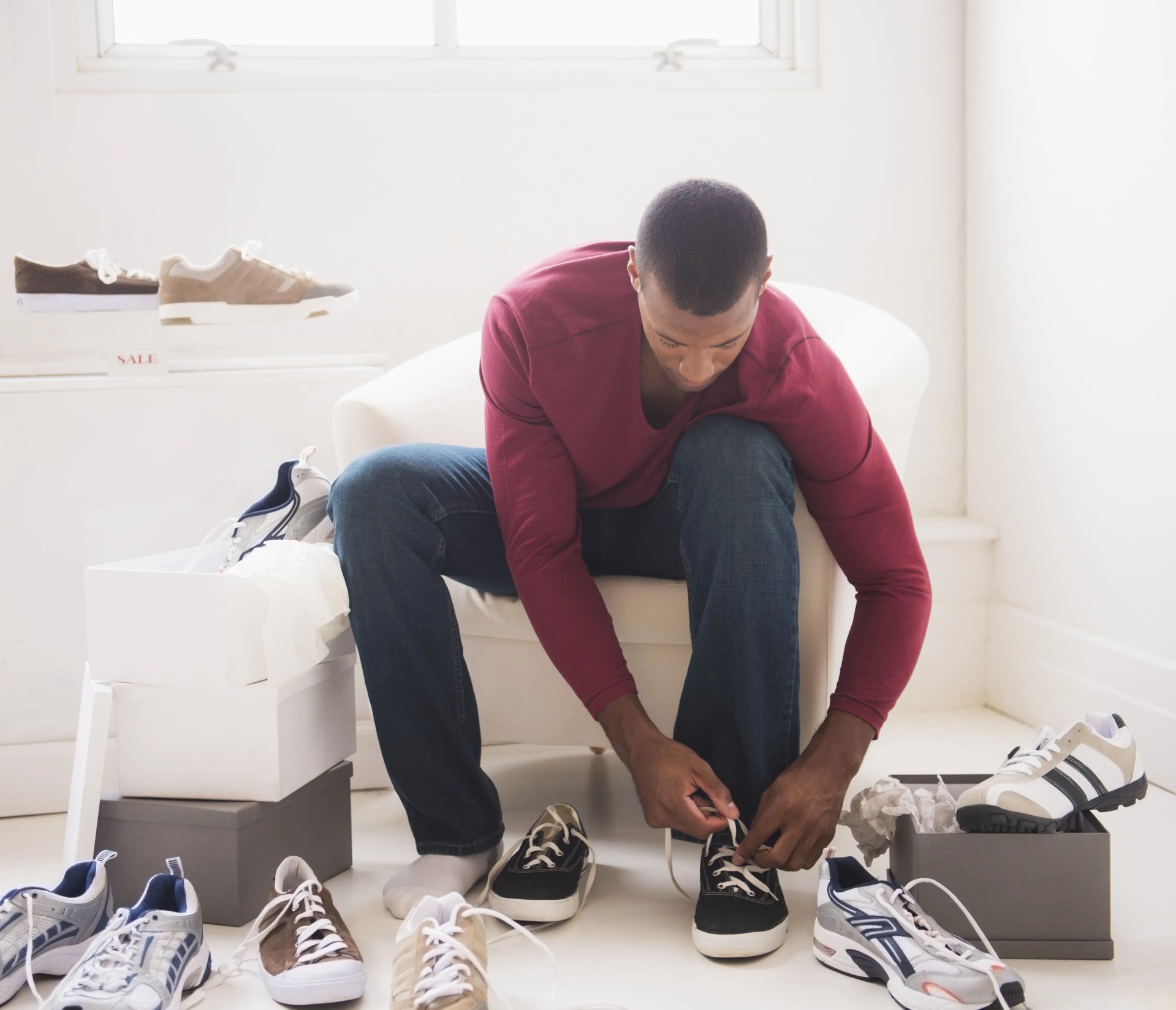 young man in shoes store