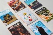 gear patrol magazine issues on a table