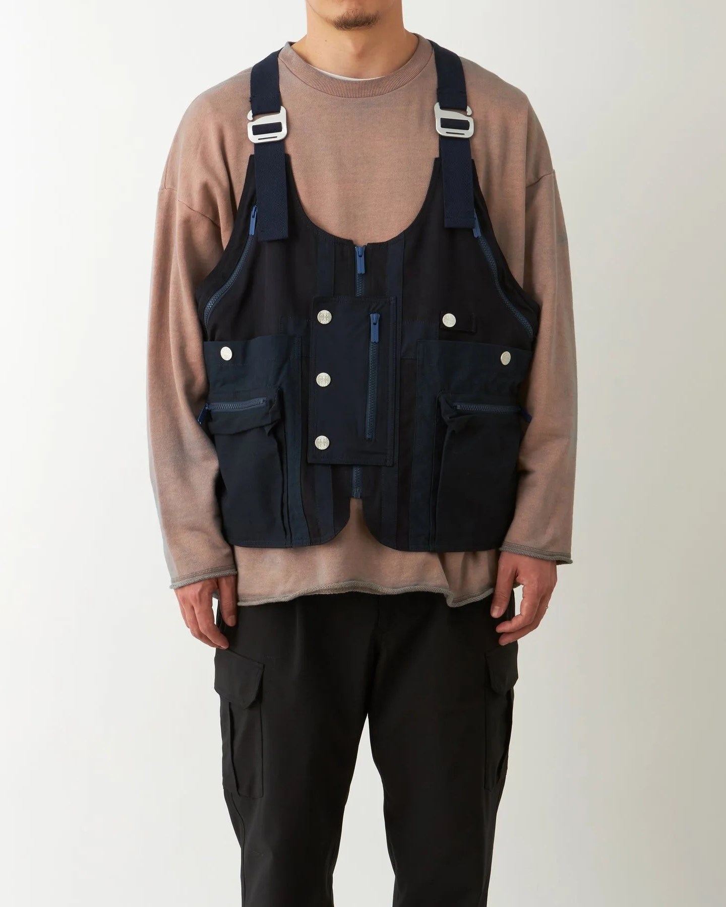 white mountaineering camping vest