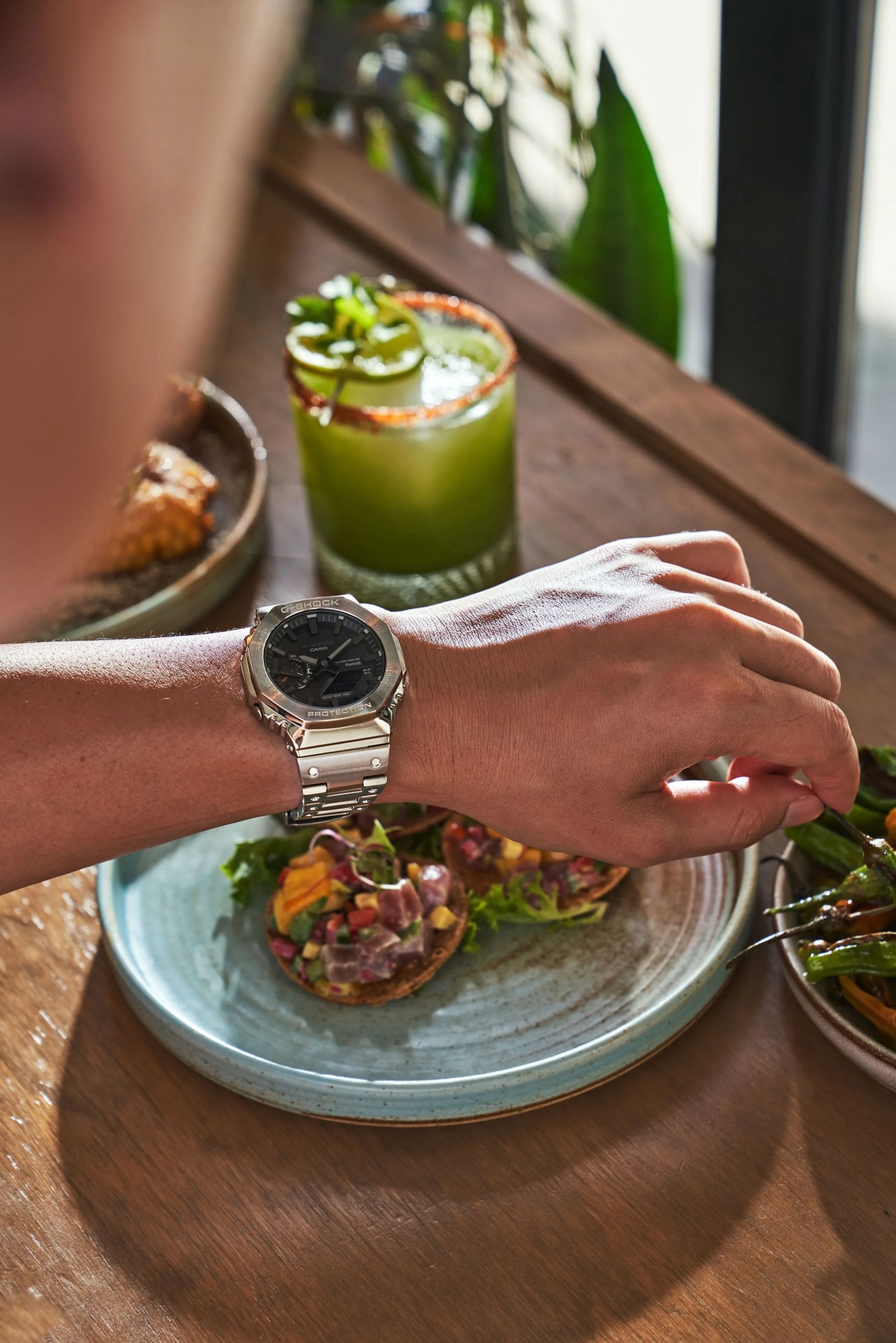 man wearing casio glashutte watch