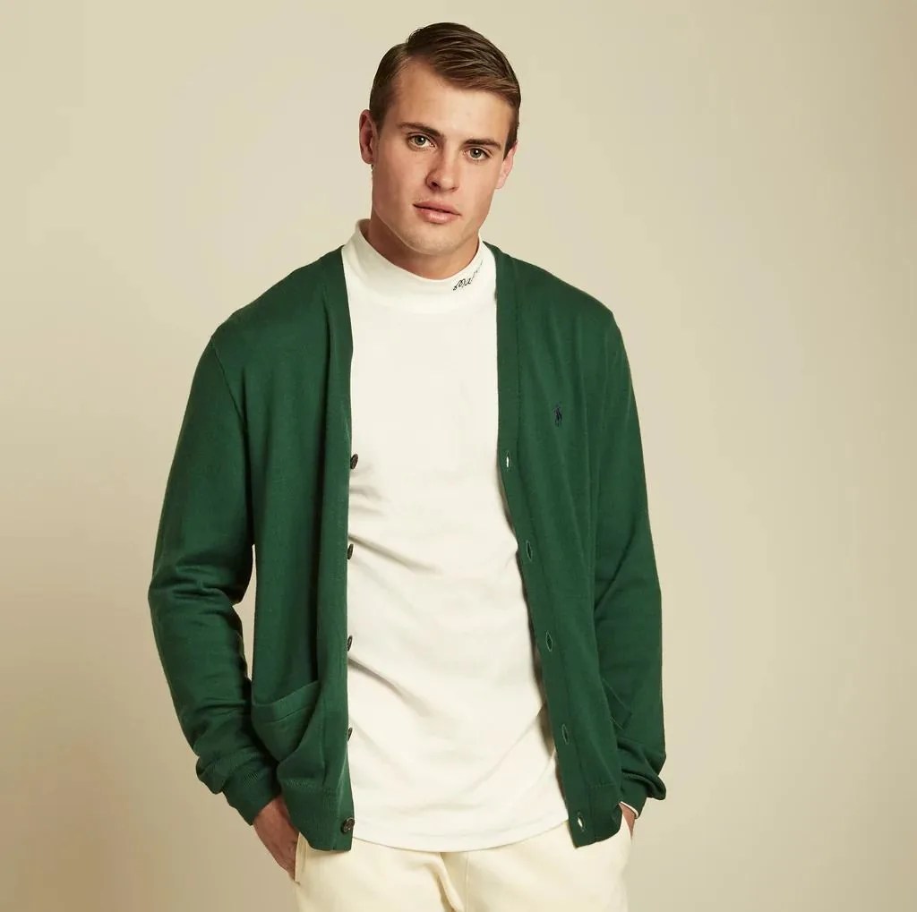 man wearing a turtle neck with sweater