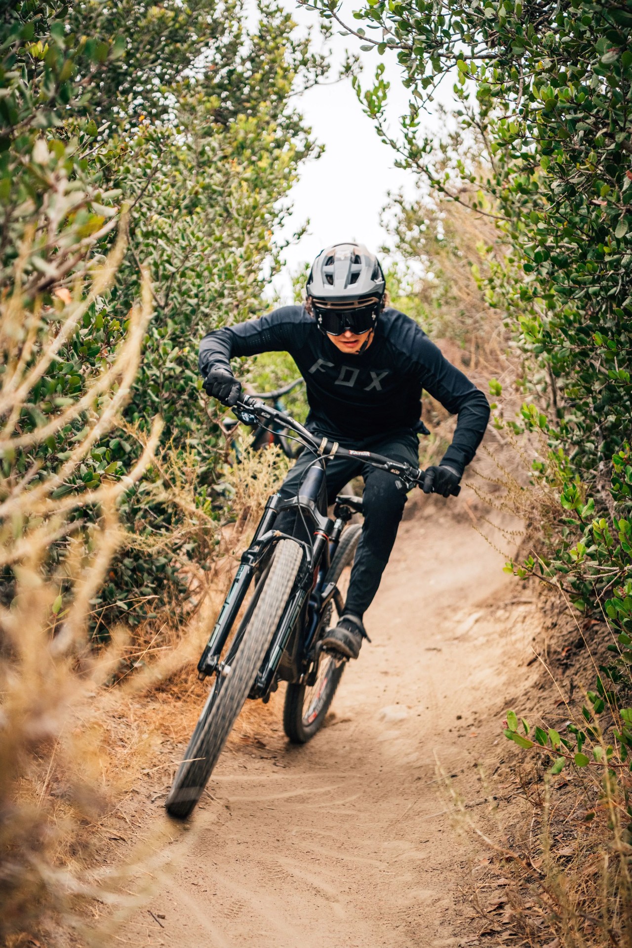 men riding bikes with fox racing gear