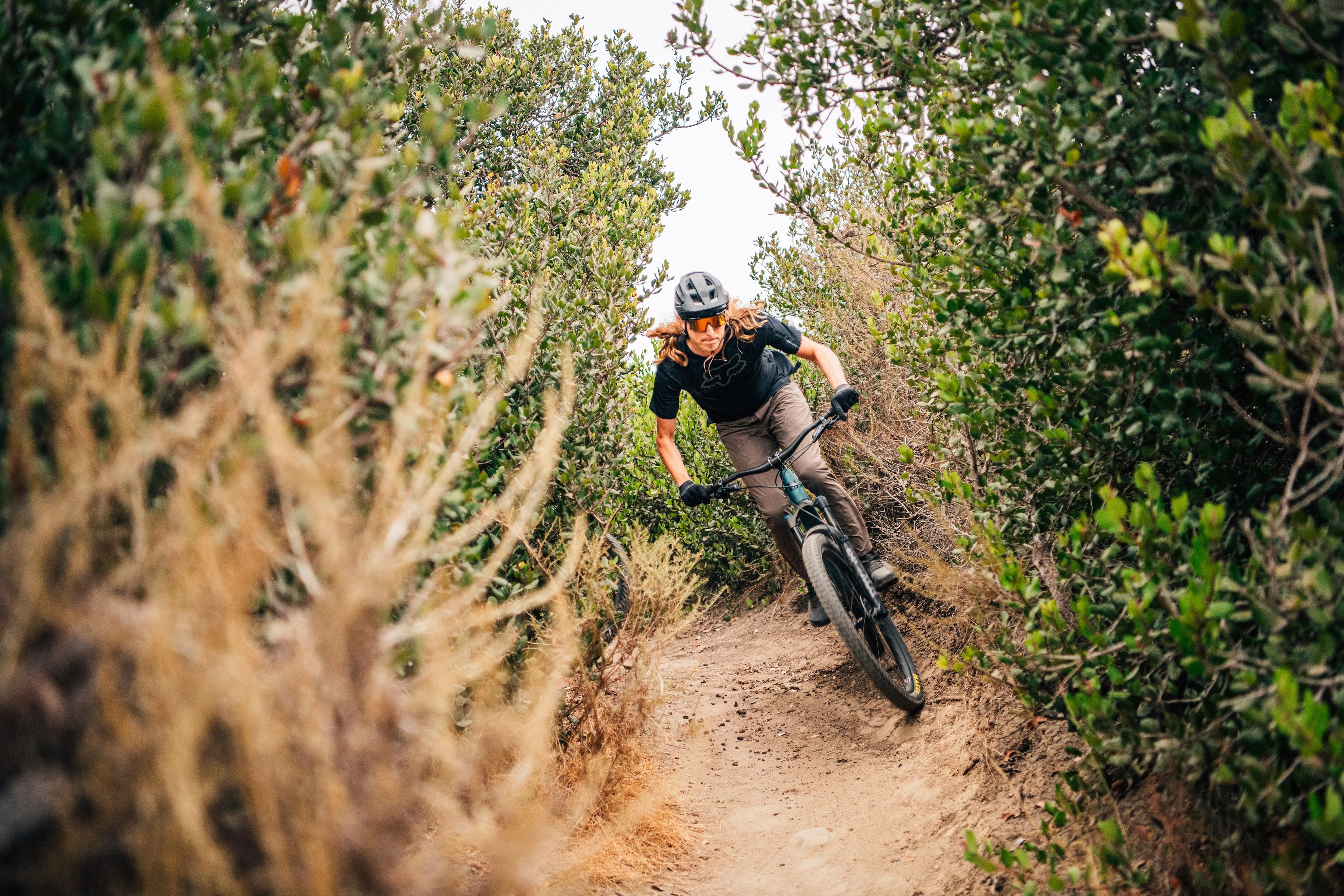 men riding bikes with fox racing gear
