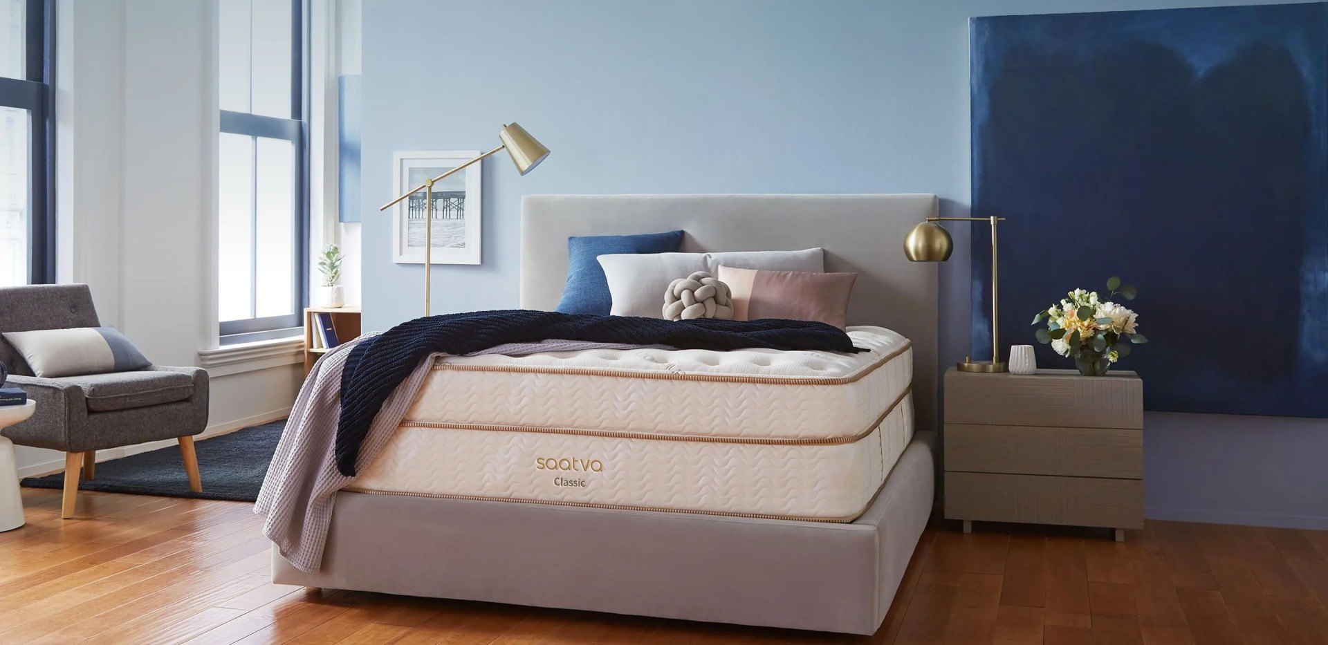 saatva mattress on a gray bed frame