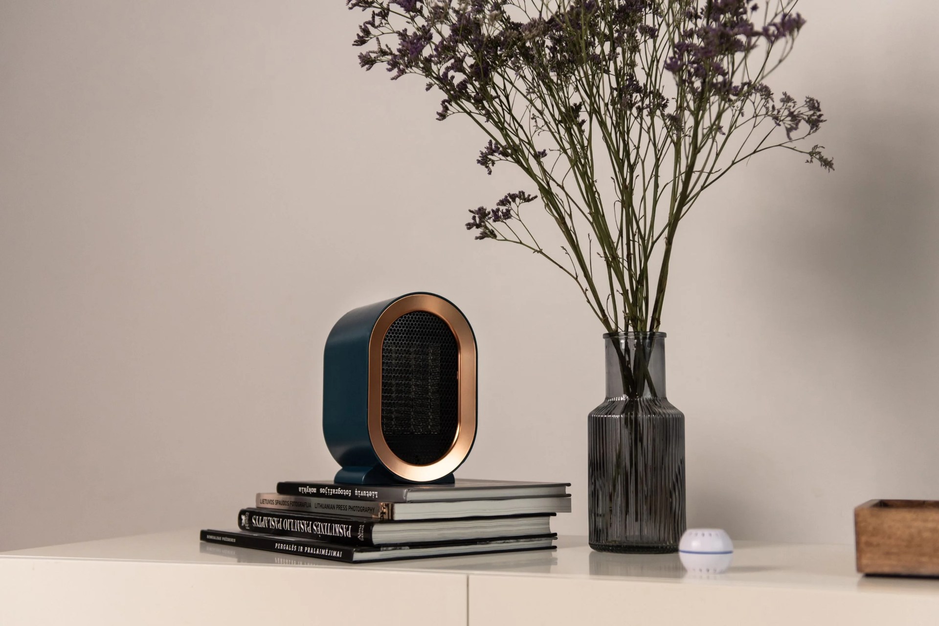 fara smart and cost effective heater sitting on top of books