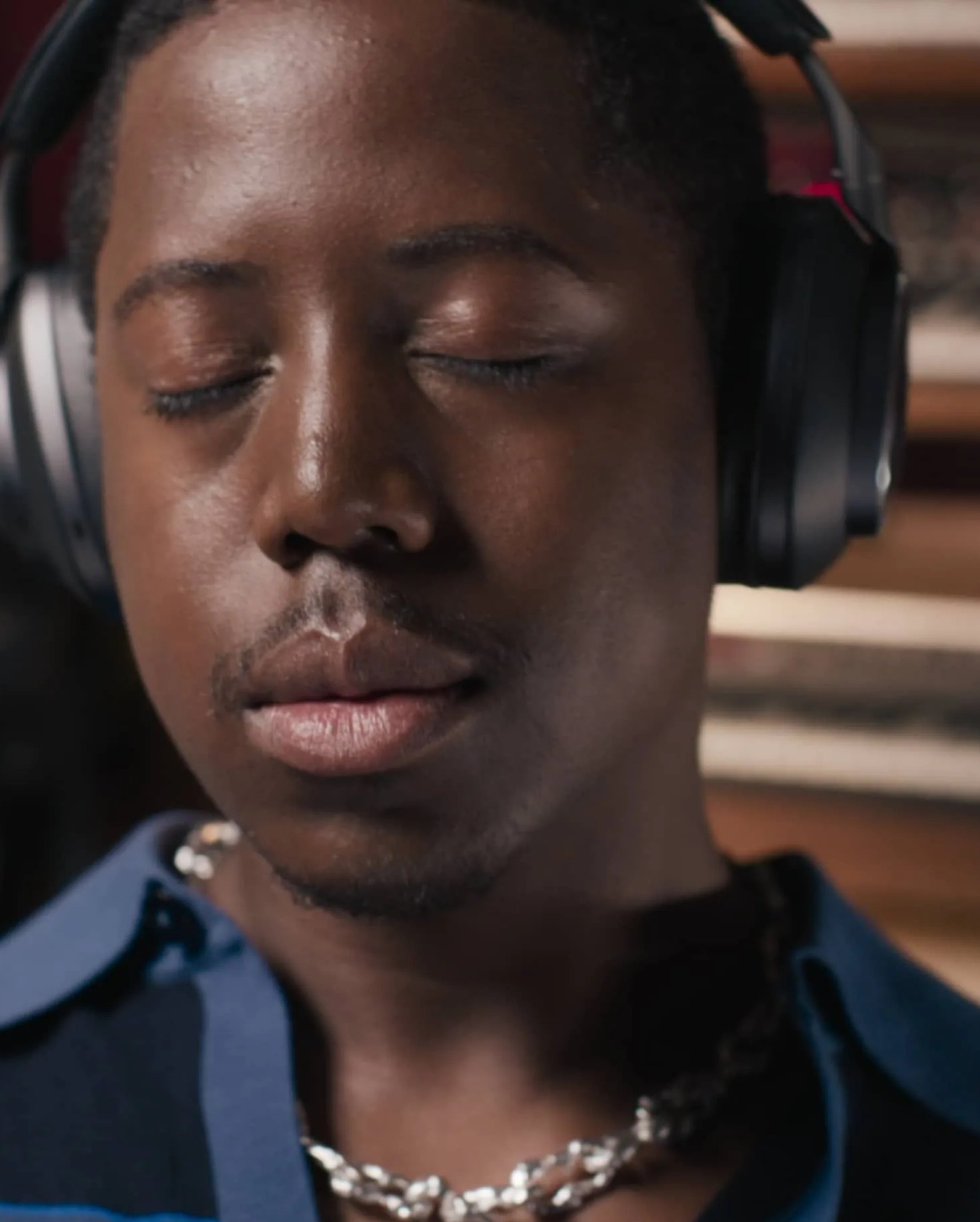 man wearing px8 headphones