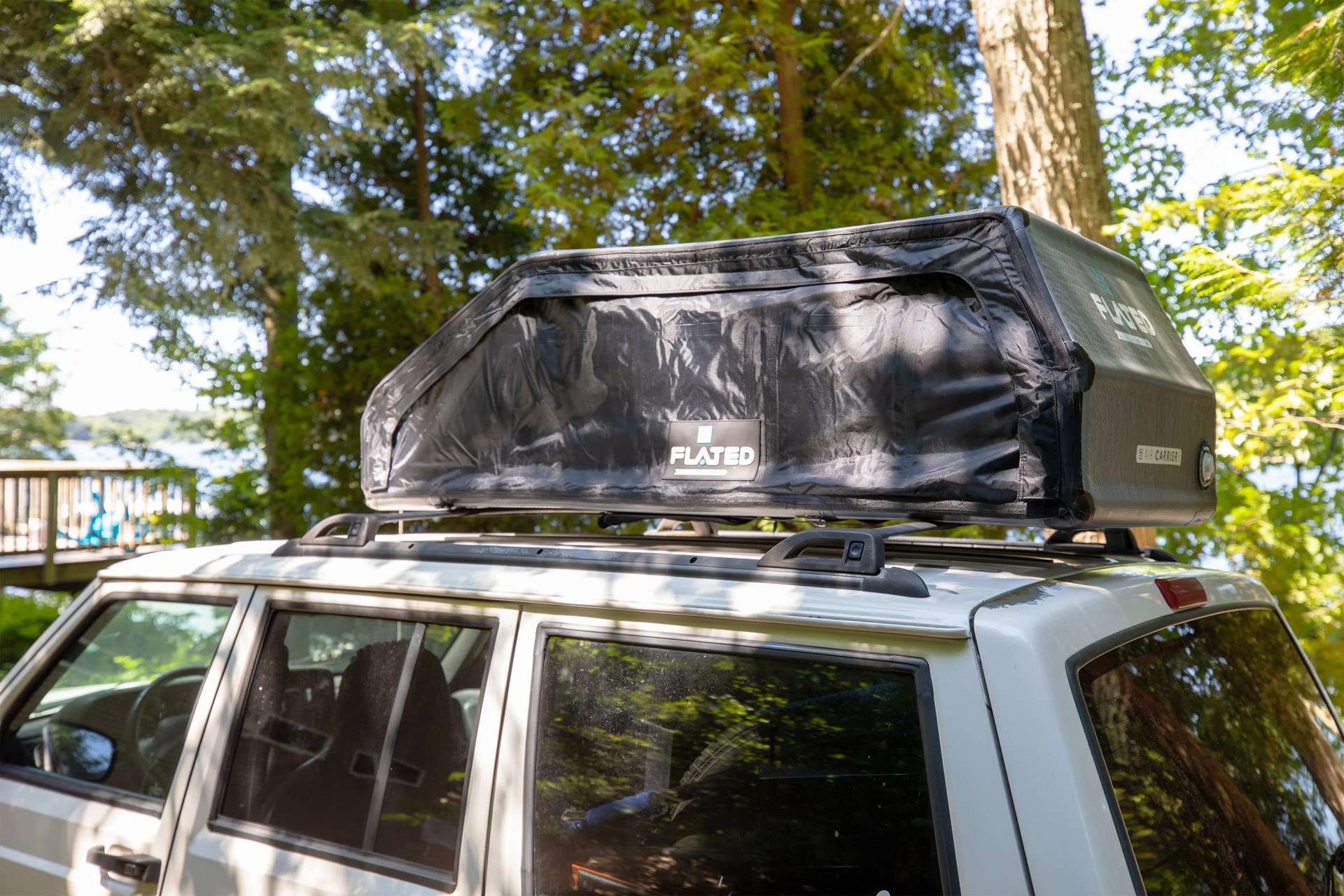 flated air carrier on top of a jeep