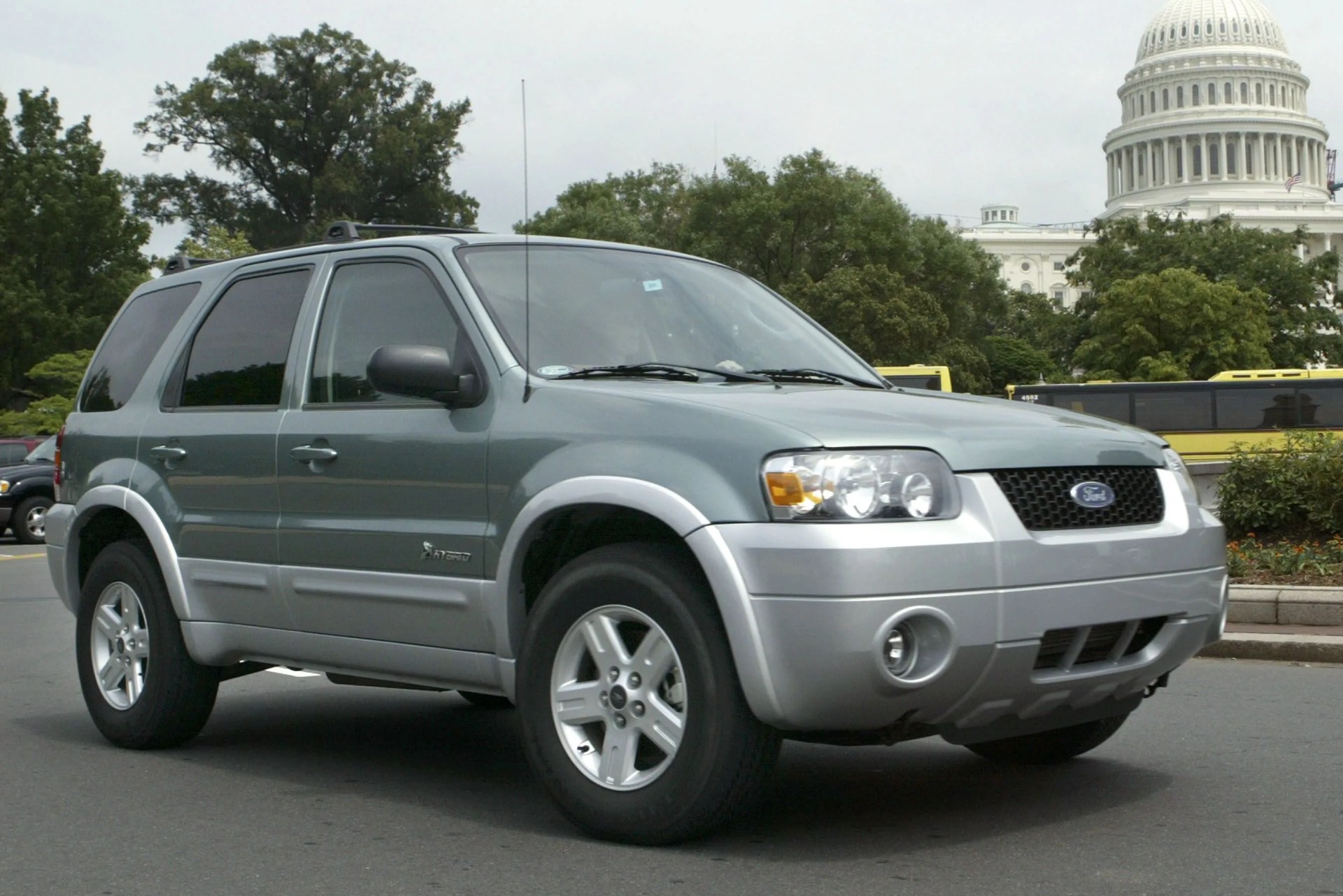old ford escape hybrid parked with us capitol in the background