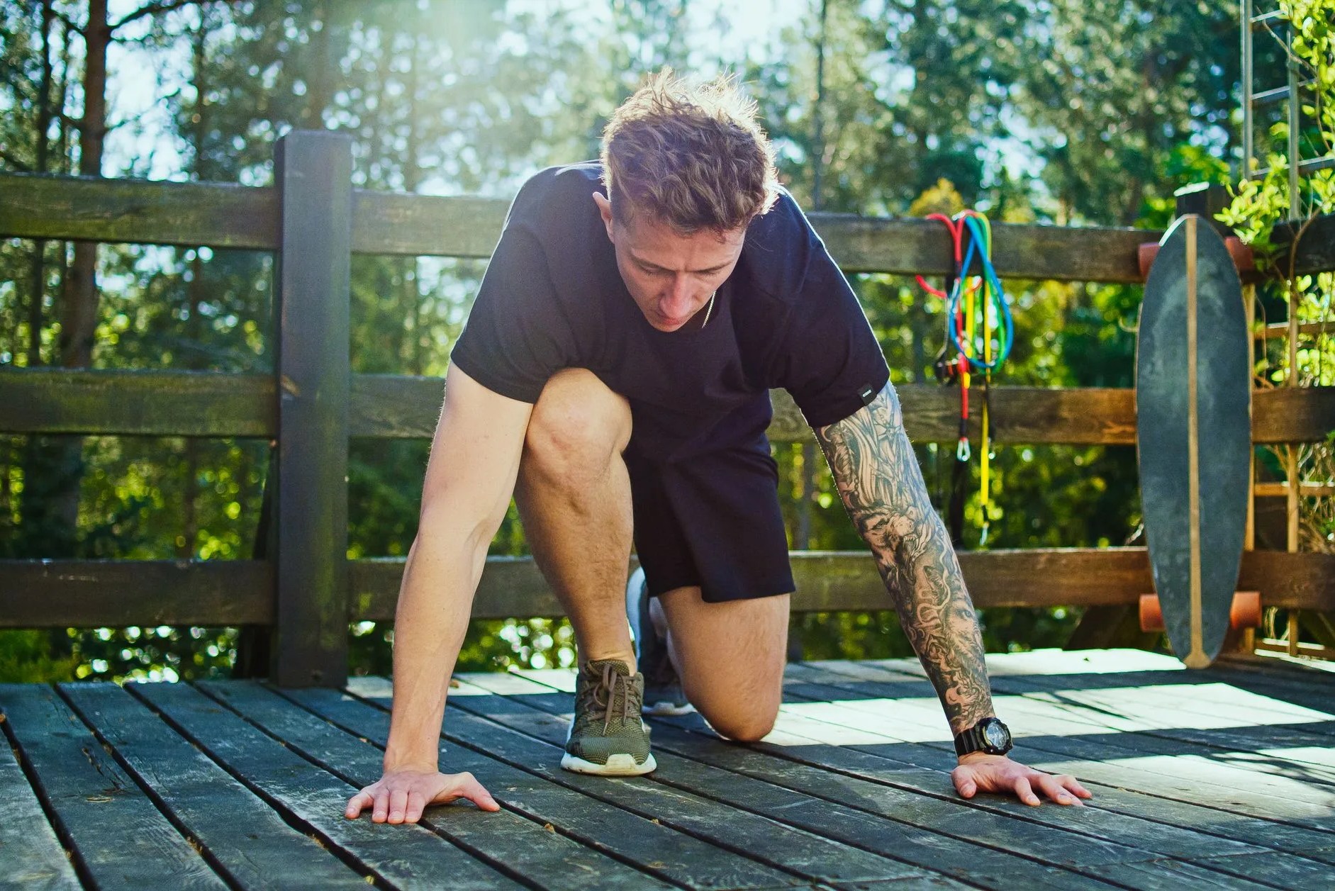 garden workout man doing push ups on a patio