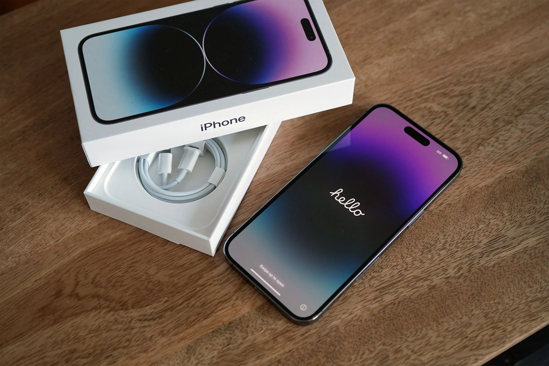 new iphone on a desk with box