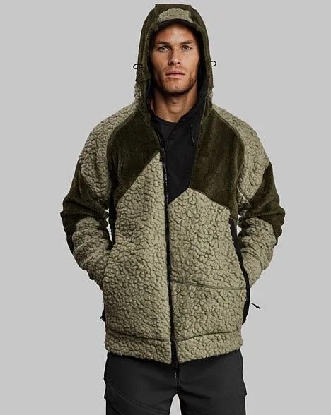 man wearing vollebak ice age fleece in grey green