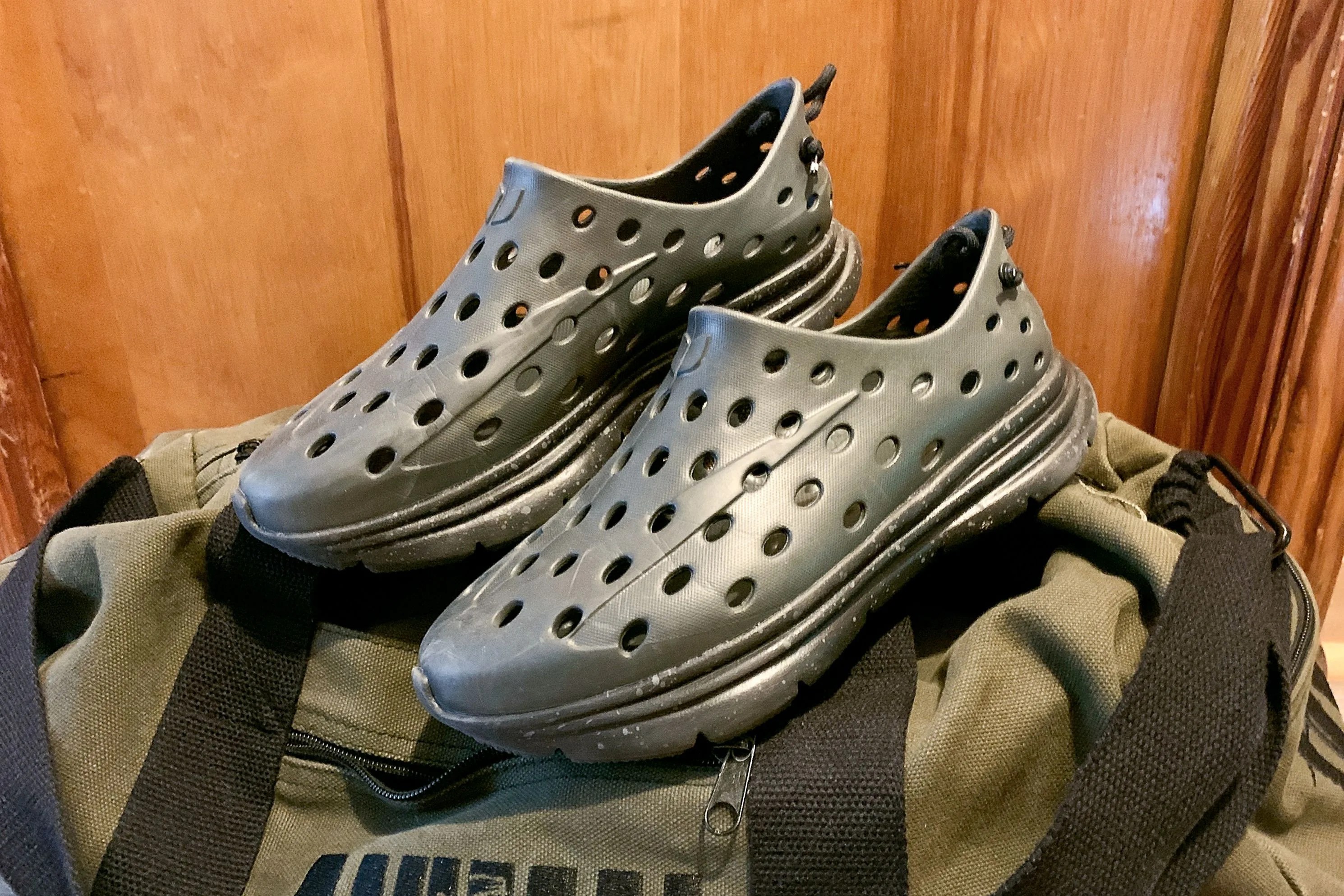 kane revive shoes sitting on top of a gym bag