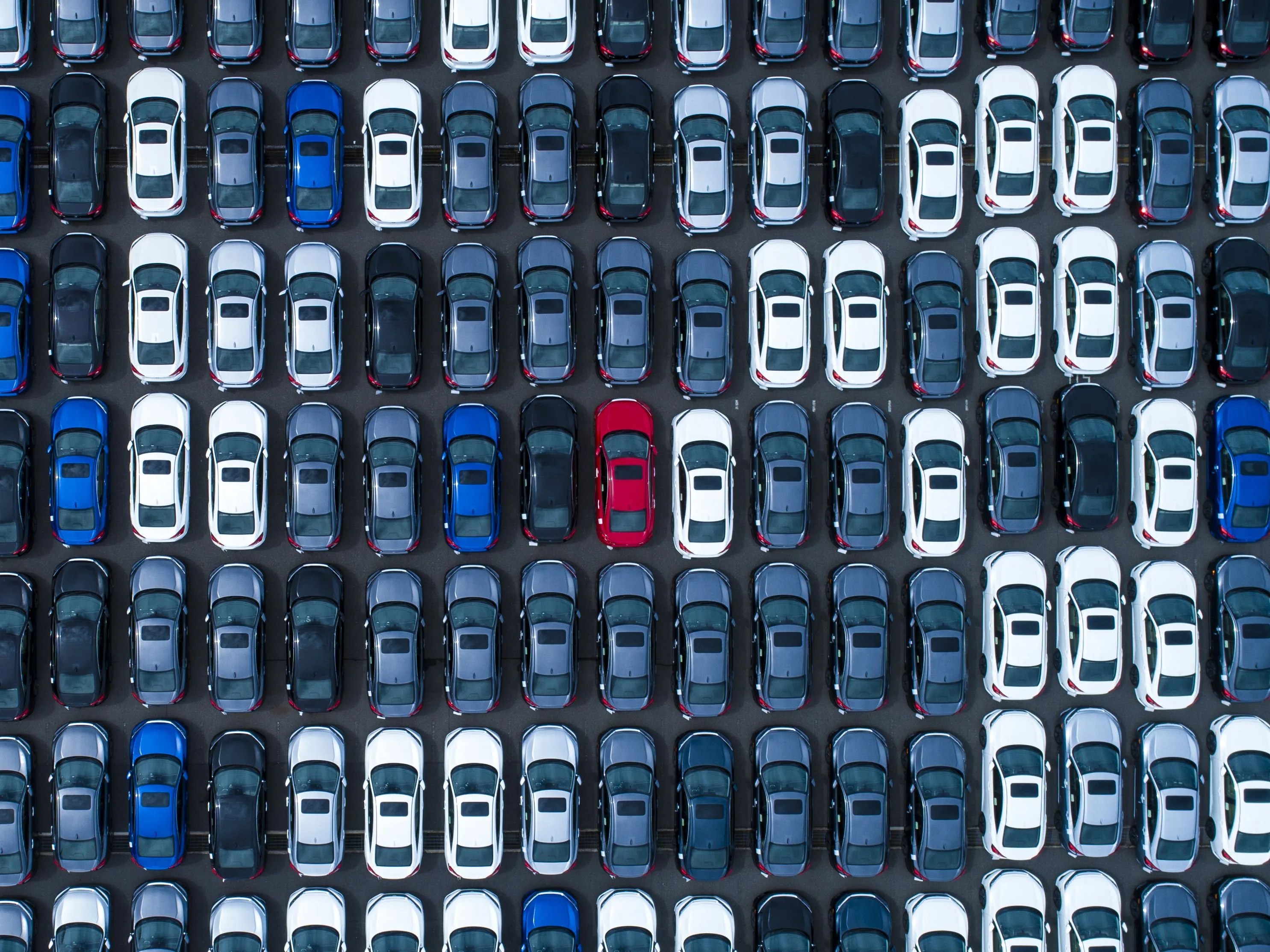 large number of cars at parking lot
