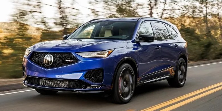 acura mdx type s driving on a highway