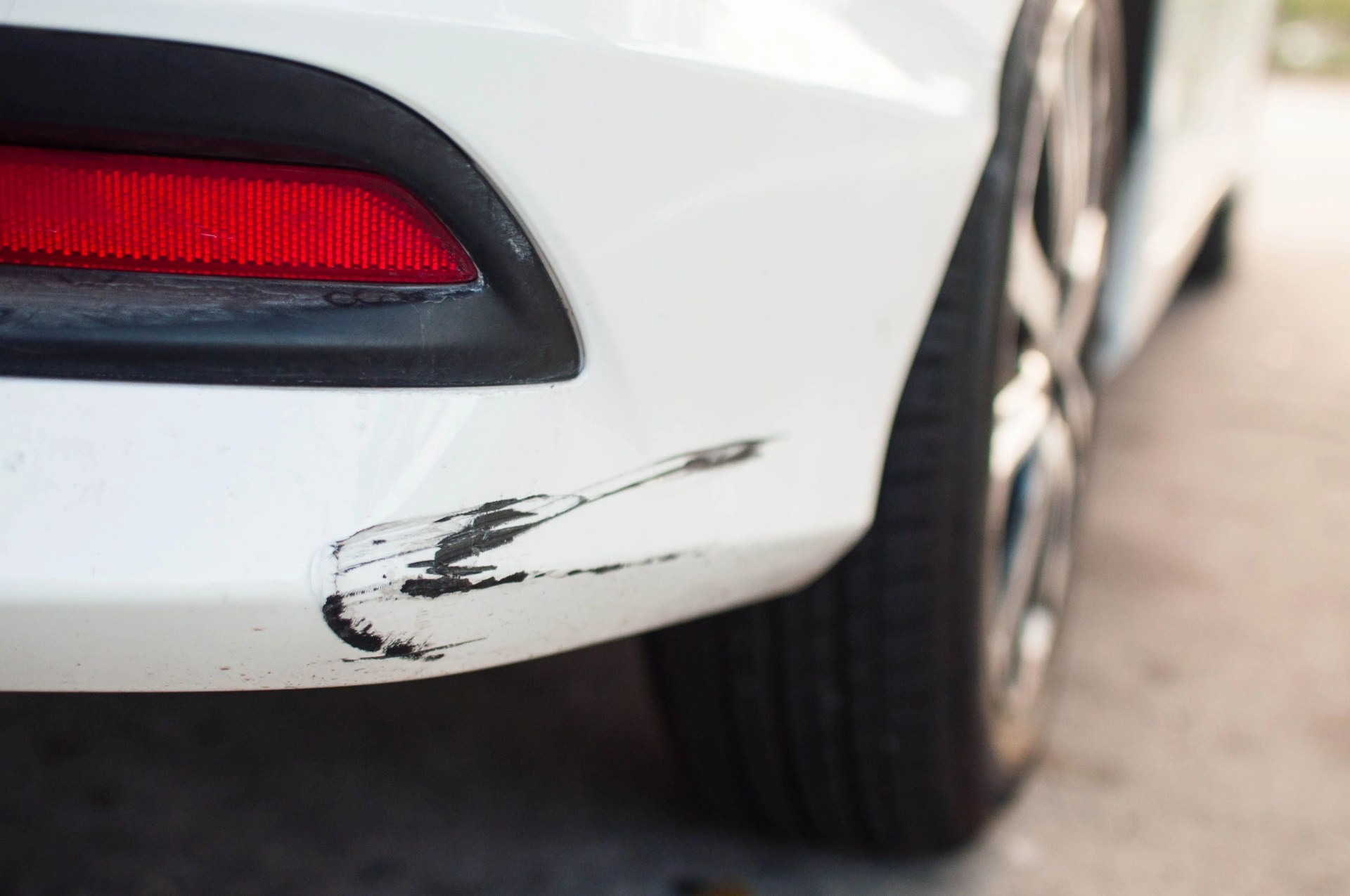 rear car bumper with damaged paint
