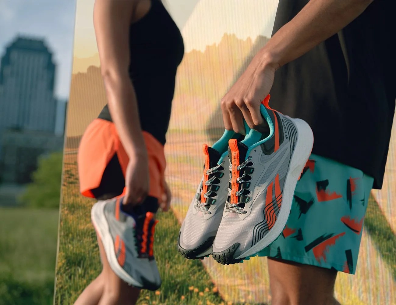 people holding pairs of reebok floatride energy 4 shoes