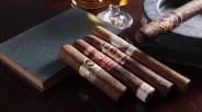 cigars on a table with a book