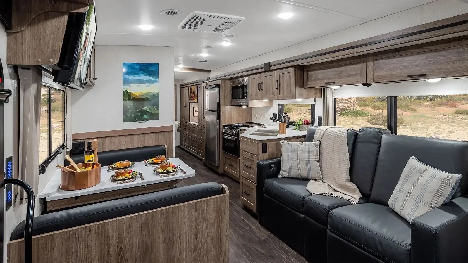 interior of winnebago vista npf trailer showing off oak cabinetry