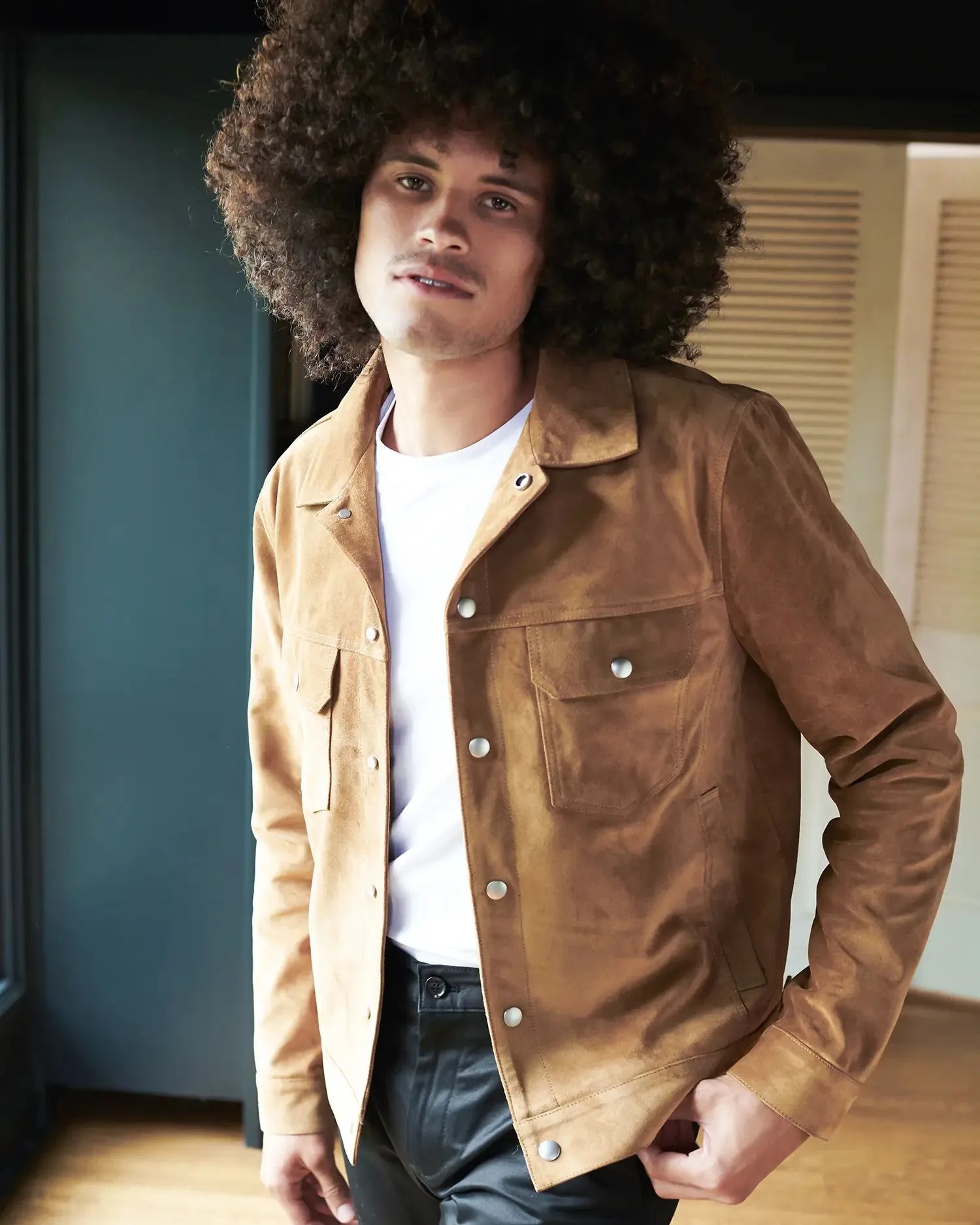 man wearing quince italian suede trucker jacket