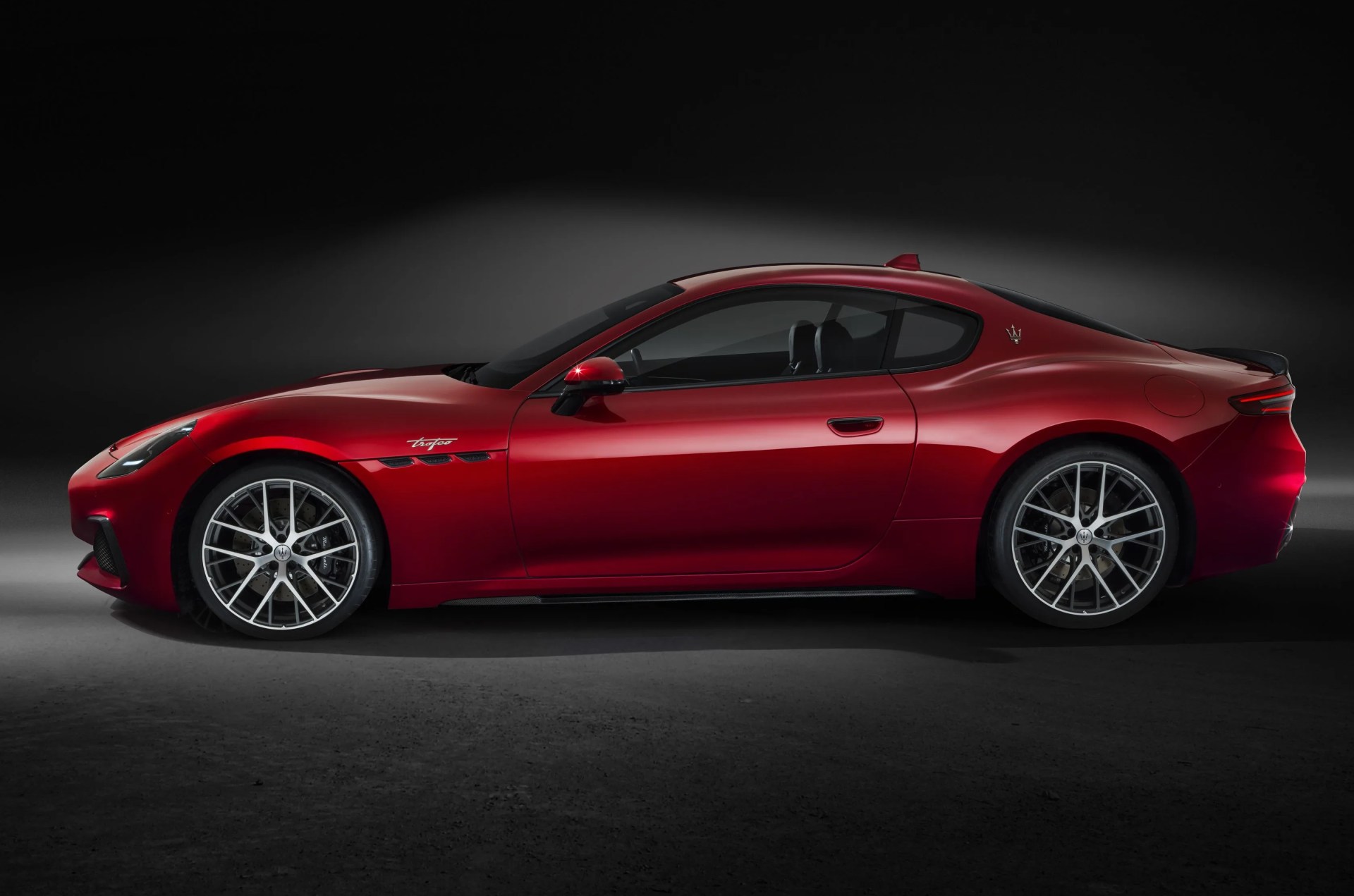 maserati granturismo with a black studio background
