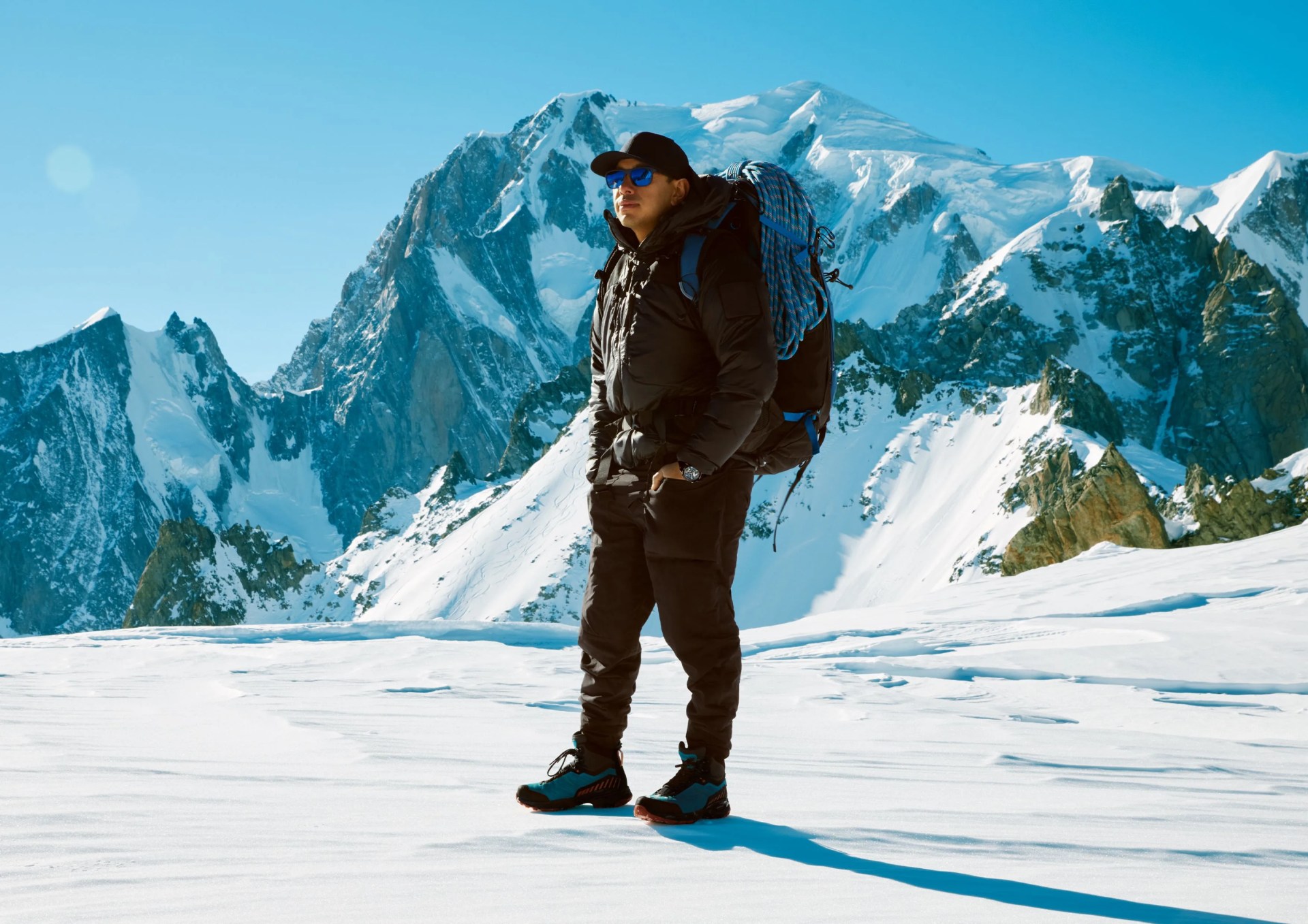 nimsdai purja with snowy mountains in the background