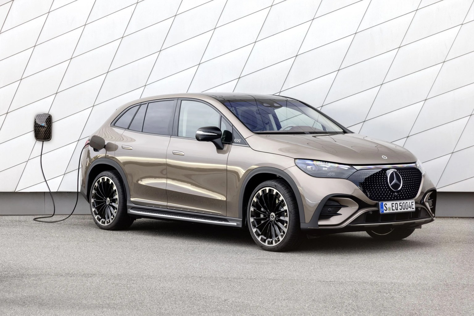 mercedes eqe suv hooked to a wall charger