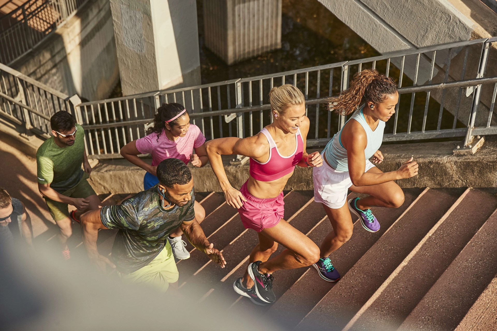 group of runners going up stairs
