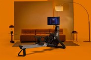 aviron strong series rower in an orange living room