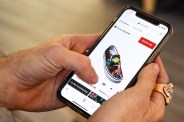 someone ordering custom shoes on vans mobile site